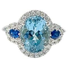 Aquamarine, Blue Sapphire and Diamond Engagement Ring In 14 Karat Gold.