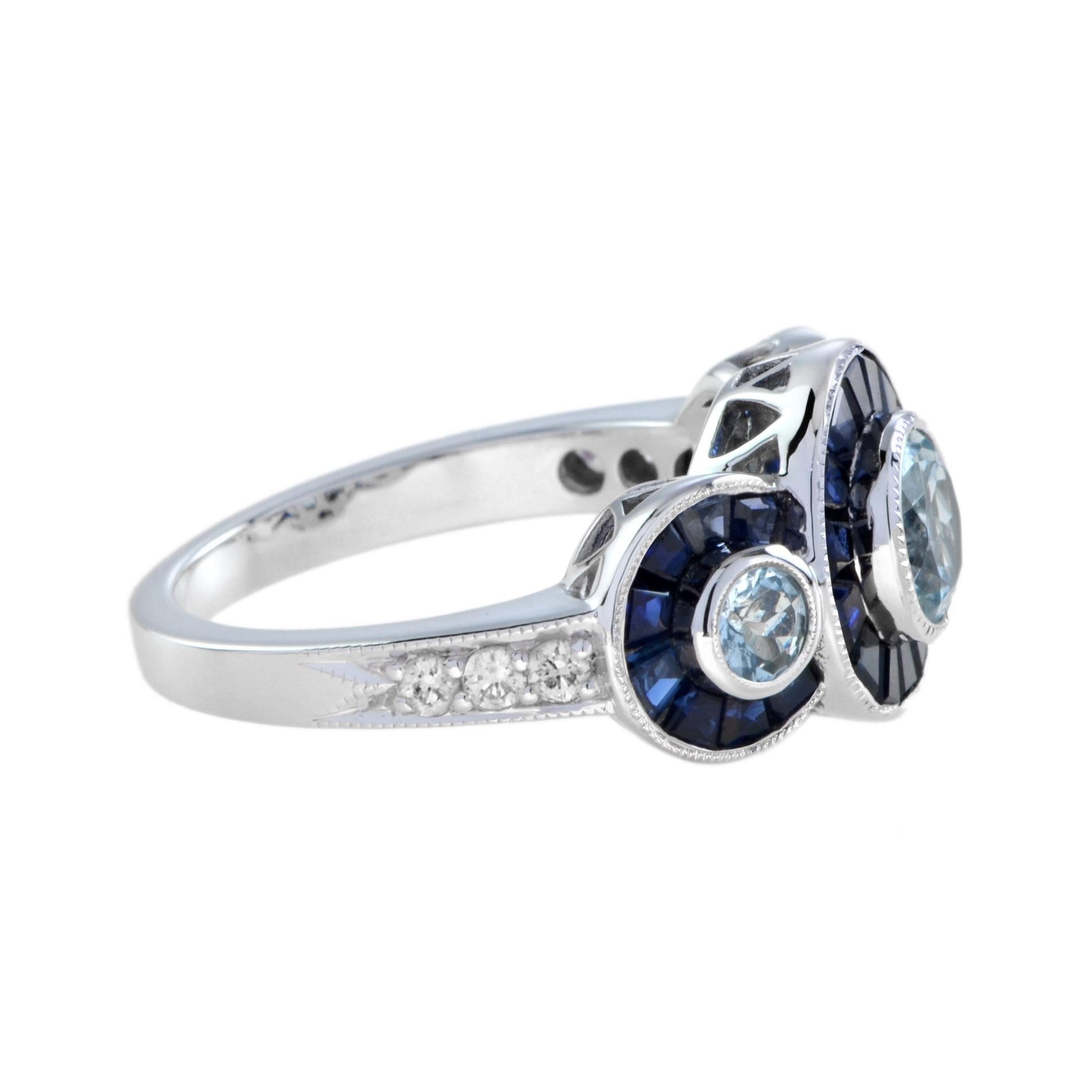 Anillo de oro de tres piedras estilo Art Déco con aguamarina, zafiro azul y halo de diamantes Corte redondo en venta