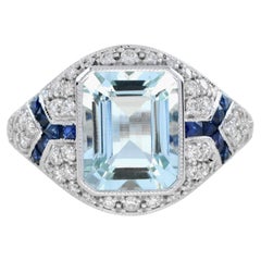 Anello di fidanzamento in stile Art Deco con diamante e zaffiro blu acquamarina in oro 14K