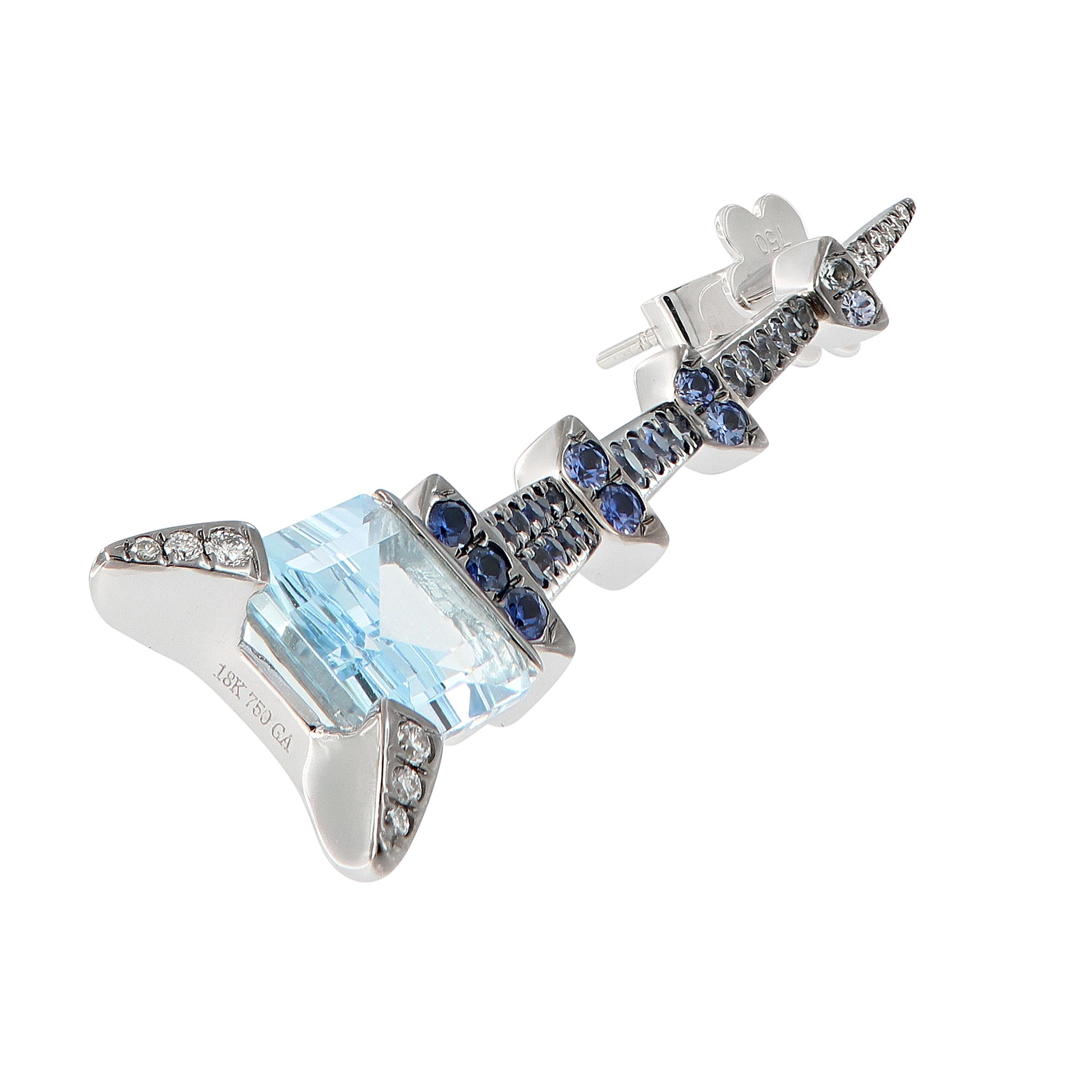 Dramatic long drop earrings in a contemporary Pagoda design. Earrings showcase two emerald cut aquamarines accented with blue sapphires and diamonds. Earrings crafted in 18k white gold and black rhodium plated. Weigh 13.2 grams. 70mm