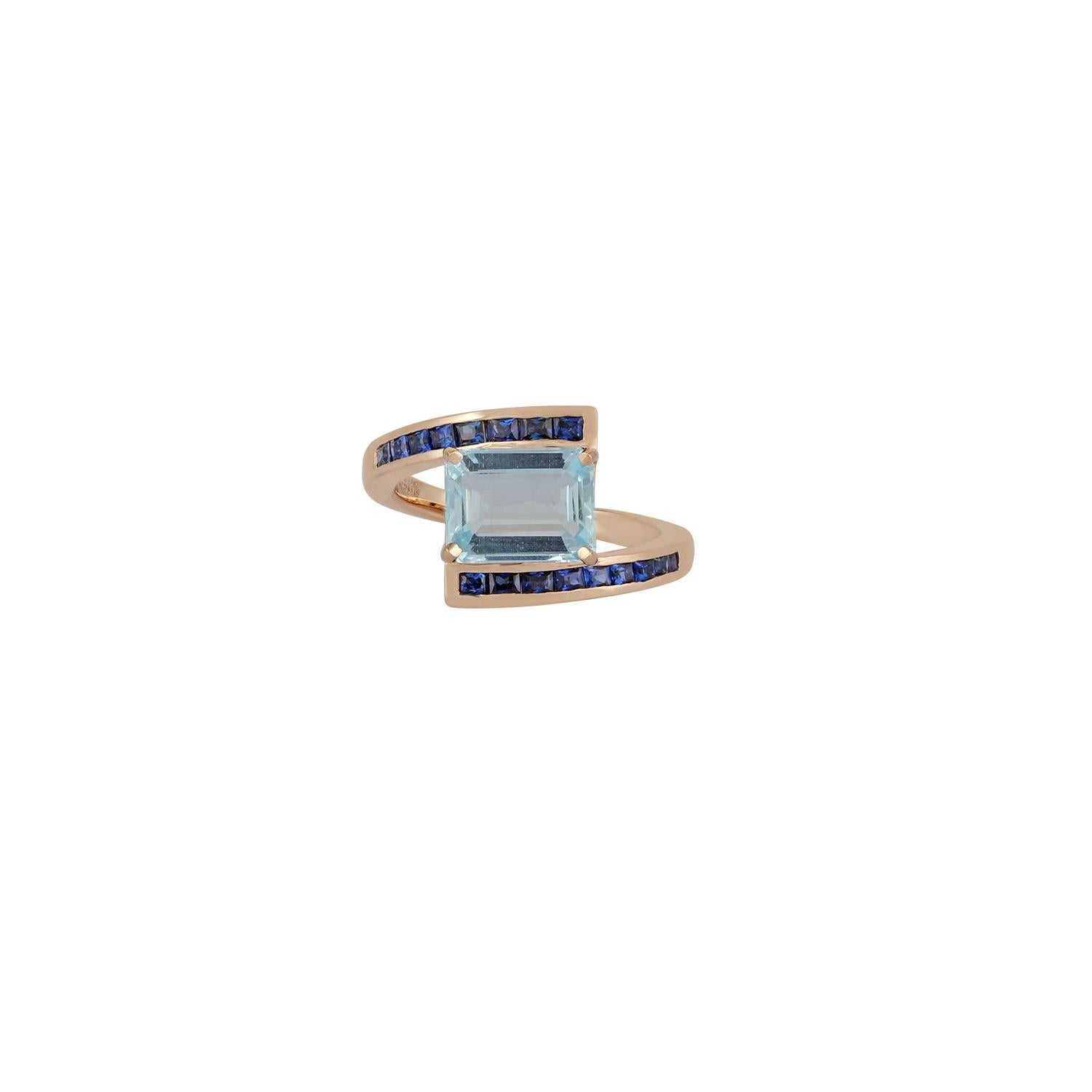 This is an exclusive aquamarine & blue sapphire ring studded in 18k yellow gold features 1 piece of octagonal shaped aquamarine weight 2.20 carat & 17 pieces of square shaped blue sapphire weight 0.65 carat, this entire ring is made of 18k yellow