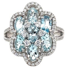 Anello a grappolo di acquamarina blu chiaro ovale a grappolo floreale in argento Anello Pietra di nascita