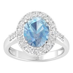 Bague cocktail aigue-marine halo de diamants 2,8 carats au total en or 14 carats