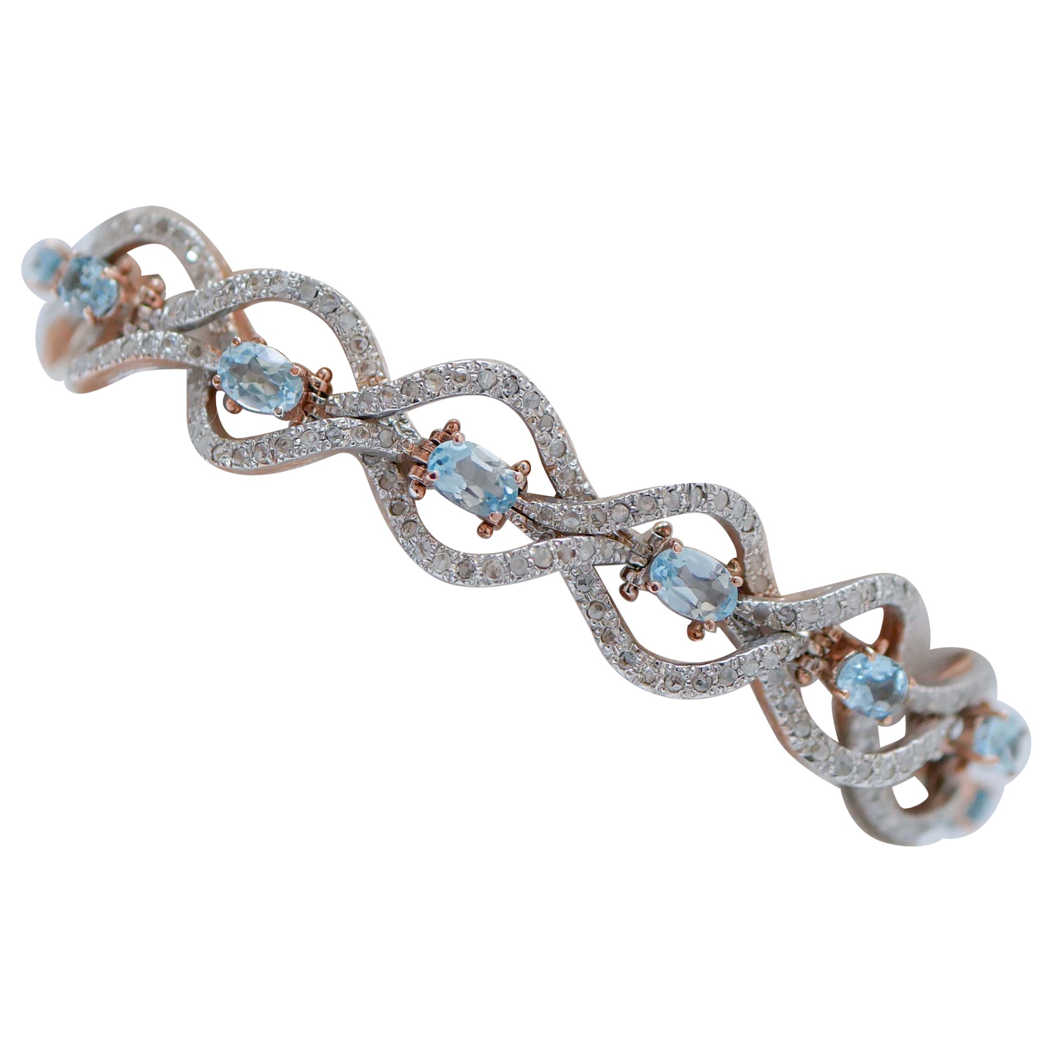 Topazi color acquamarina, diamanti, bracciale Retrò in oro rosa e argento.
