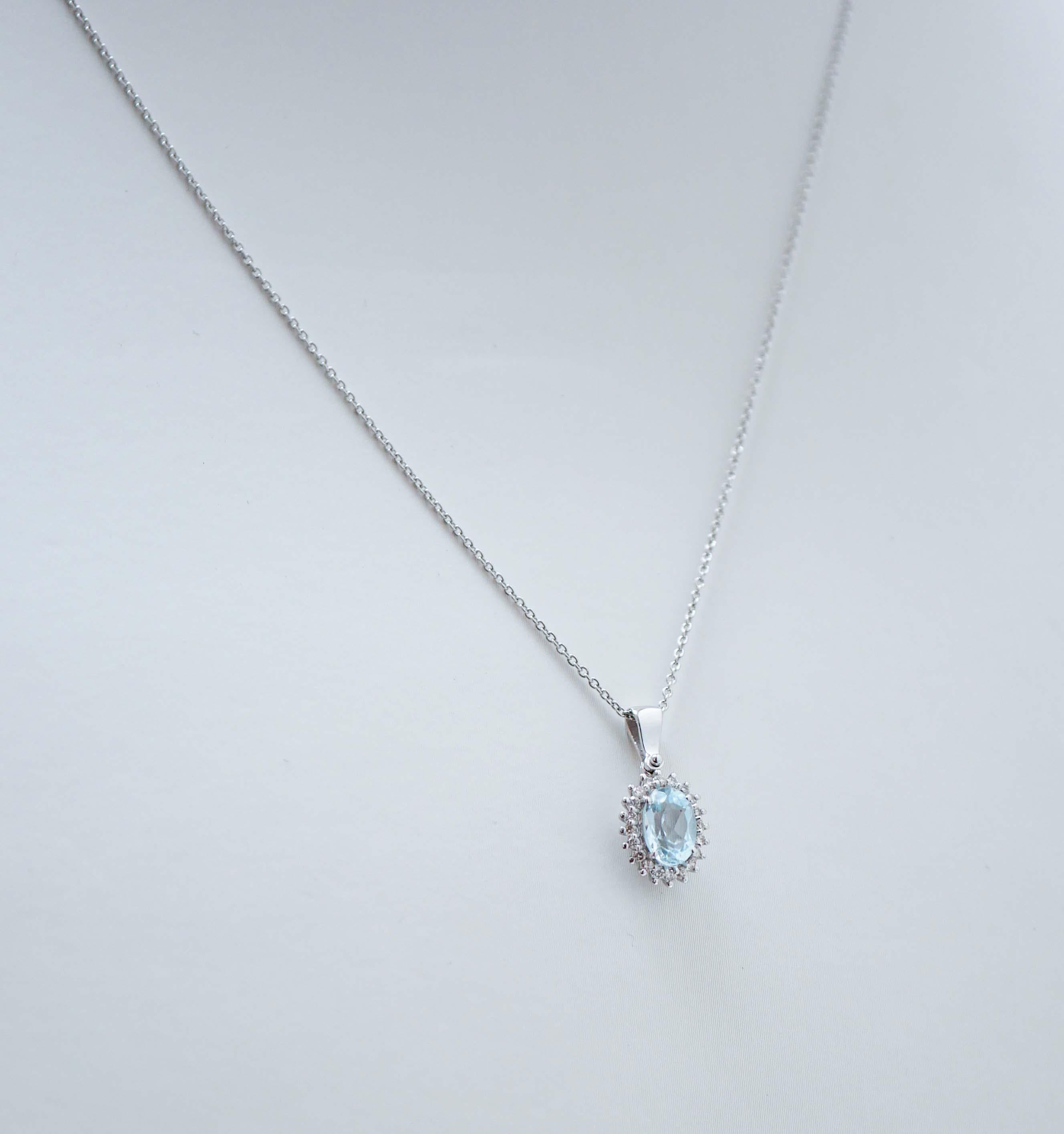 Modern Aquamarine Colour Topaz, Diamonds, 18 Karat White Gold Pendant Necklace. For Sale