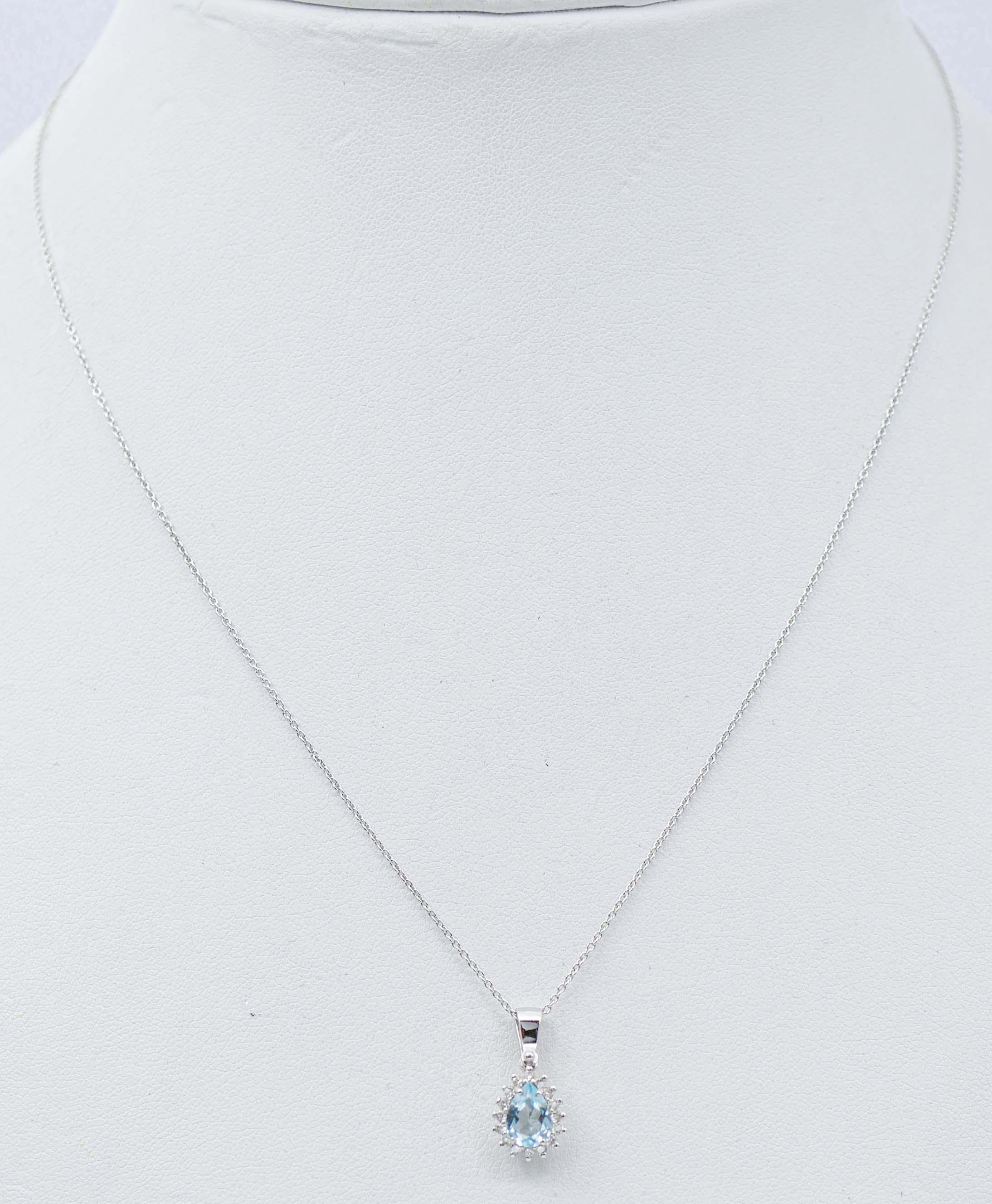 Mixed Cut Aquamarine Colour Topaz, Diamonds, 18 Karat White Gold Pendant Necklace.