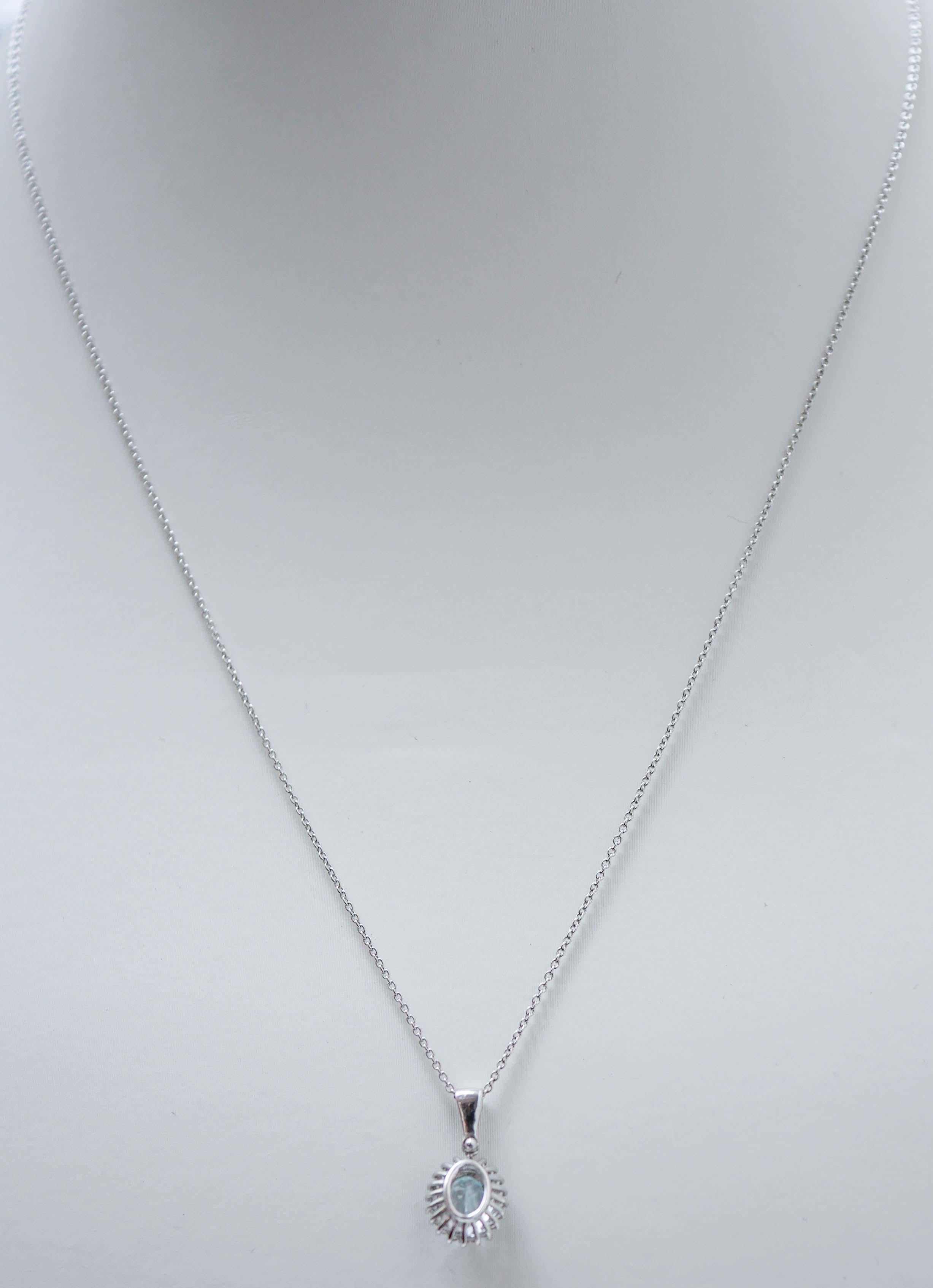 Mixed Cut Aquamarine Colour Topaz, Diamonds, 18 Karat White Gold Pendant Necklace. For Sale