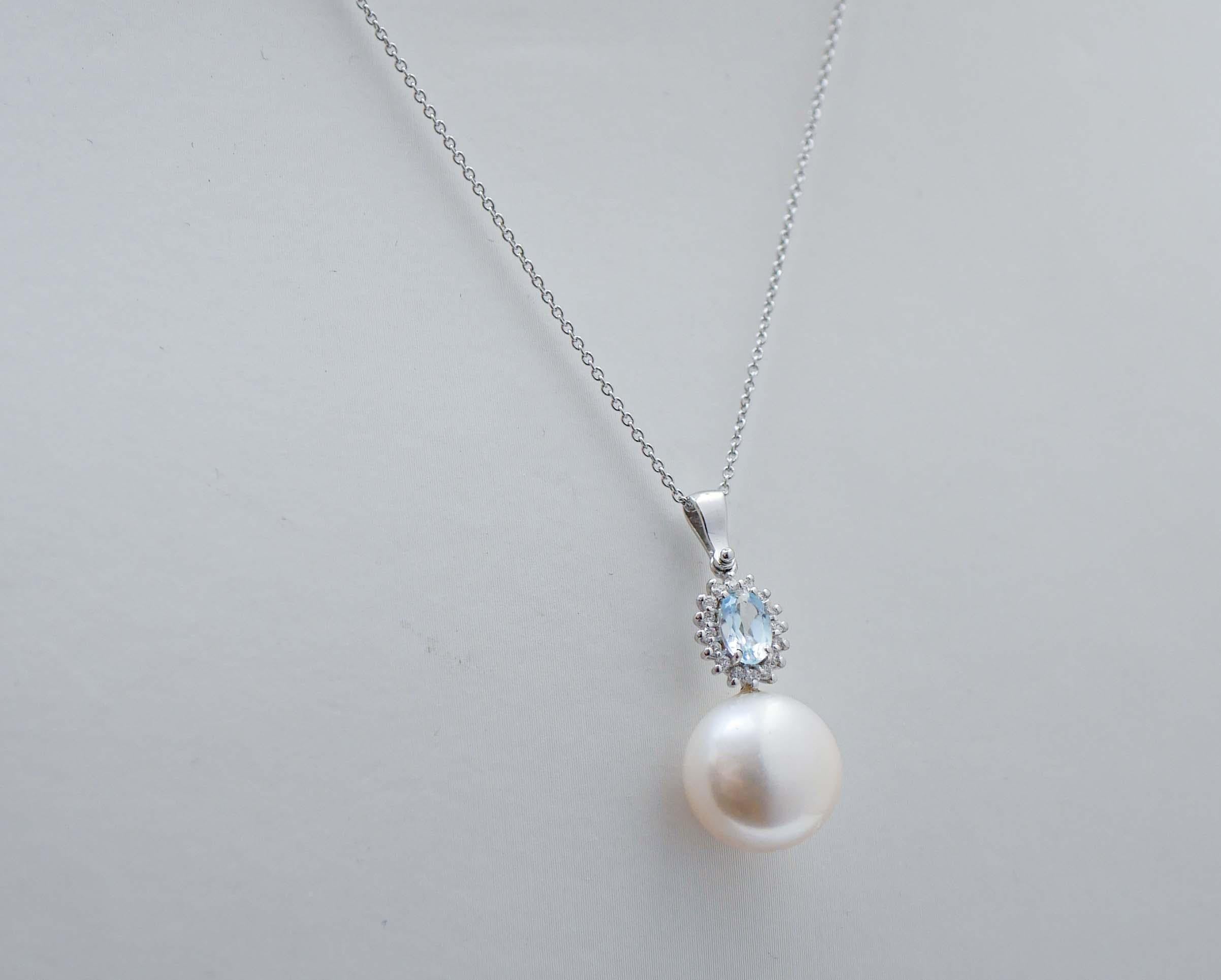 Modern Aquamarine Colour Topaz, Diamonds, Pearl, 18 Karat White Gold Pendant Necklace. For Sale
