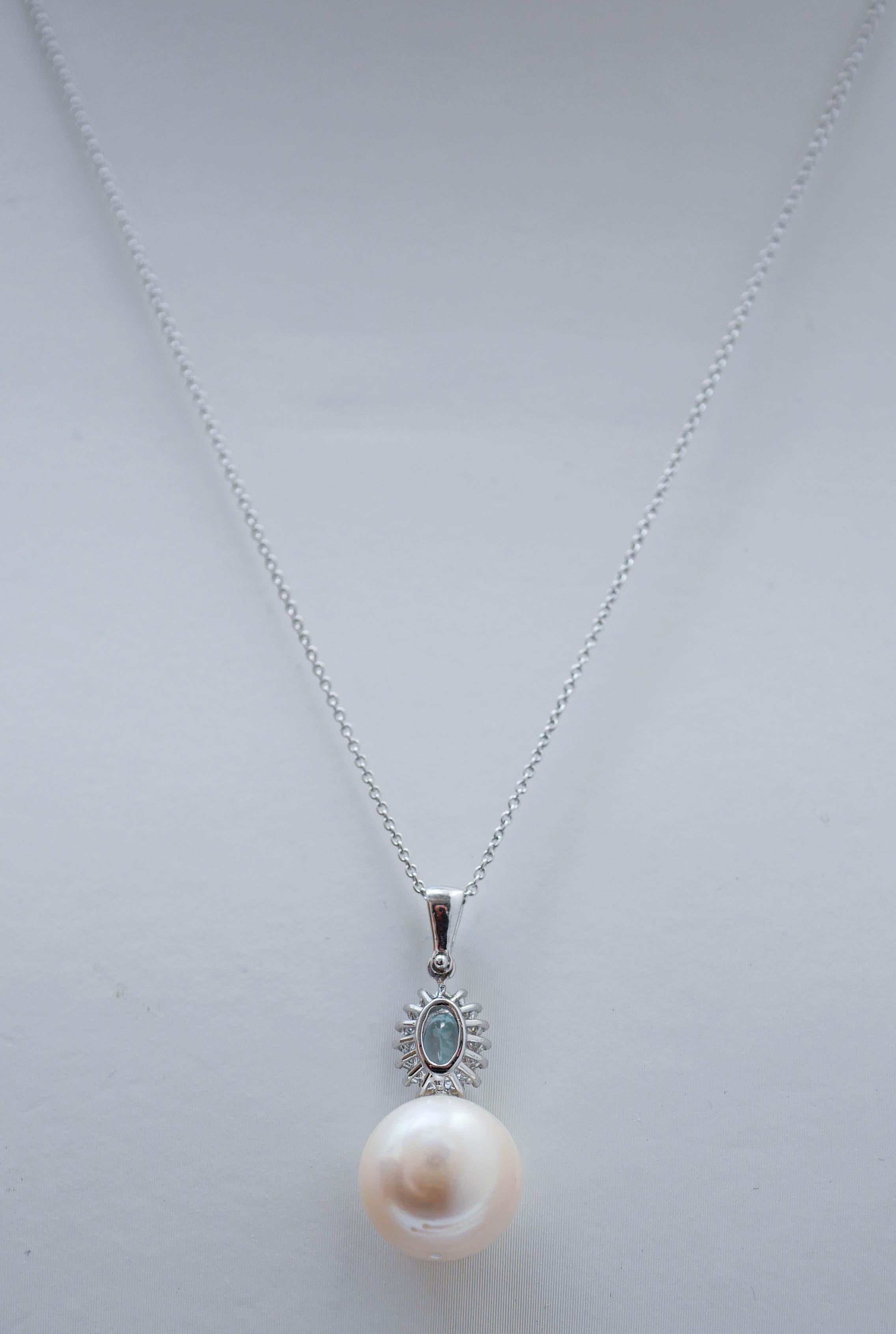Mixed Cut Aquamarine Colour Topaz, Diamonds, Pearl, 18 Karat White Gold Pendant Necklace. For Sale
