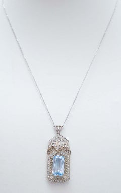 Aquamarine Colour Topaz, Diamonds, 18 Karat White Gold Pendant Necklace.