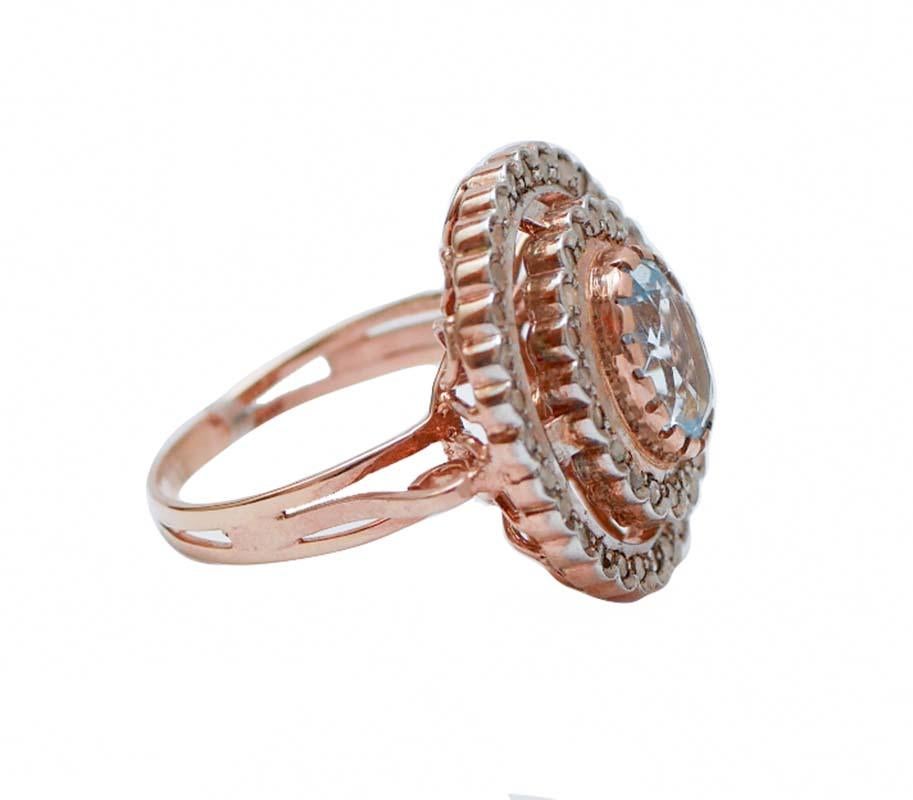 Amazing ring in 9 kt rose gold and silver structure mounted with a central topaz surrounded by diamonds.
This ring was totally handmade by Italian master goldsmiths and it is in perfect conditions.
Diamonds 0.54 ct
Topaz 3.00 ct
Total Weight 8.30