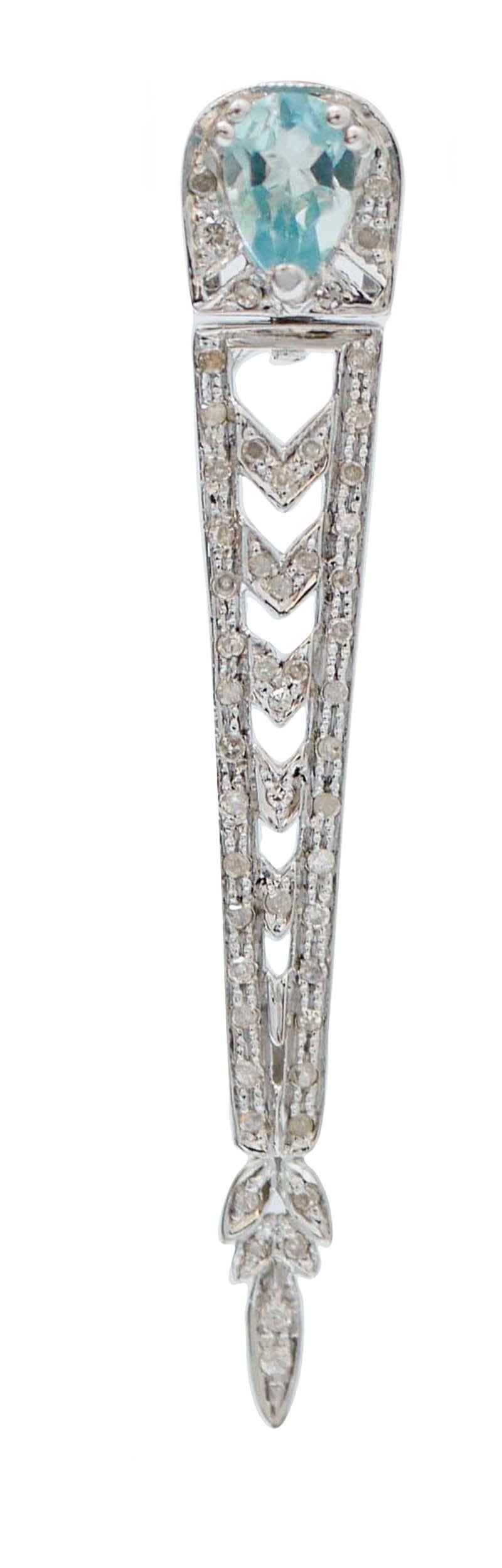 Incredibili orecchini pendenti con struttura in oro bianco 9 carati montati con due topazi a goccia nella parte superiore circondati da diamanti e, sotto, una pioggia di diamanti.
Questi orecchini sono stati realizzati totalmente a mano da maestri