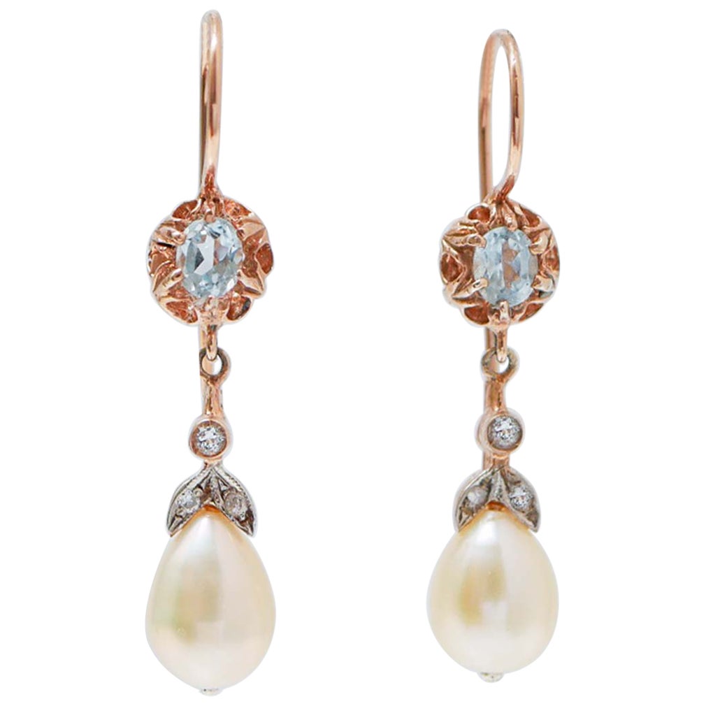 Orecchini in Topazio color acquamarina, perle, diamanti, oro rosa e argento.