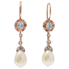 Orecchini in Topazio color acquamarina, perle, diamanti, oro rosa e argento.