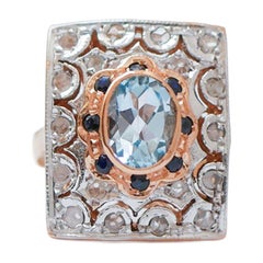 Aquamarine Colour Topaz, Sapphires, Diamonds, Rose Gold and Silver Ring.