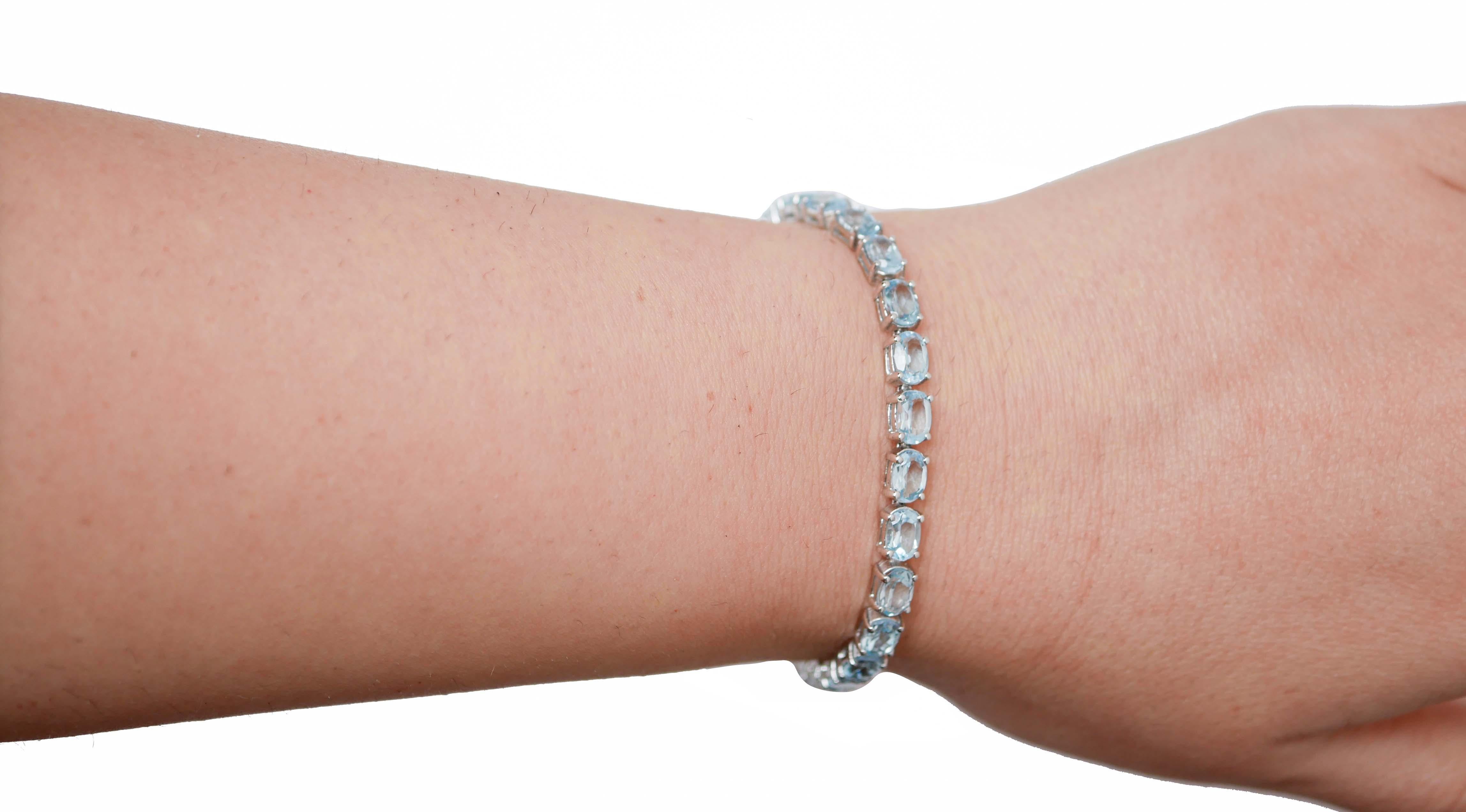 Oval Cut Aquamarine Colour Topazs, 14 Karat White Gold Tennis Bracelet. For Sale