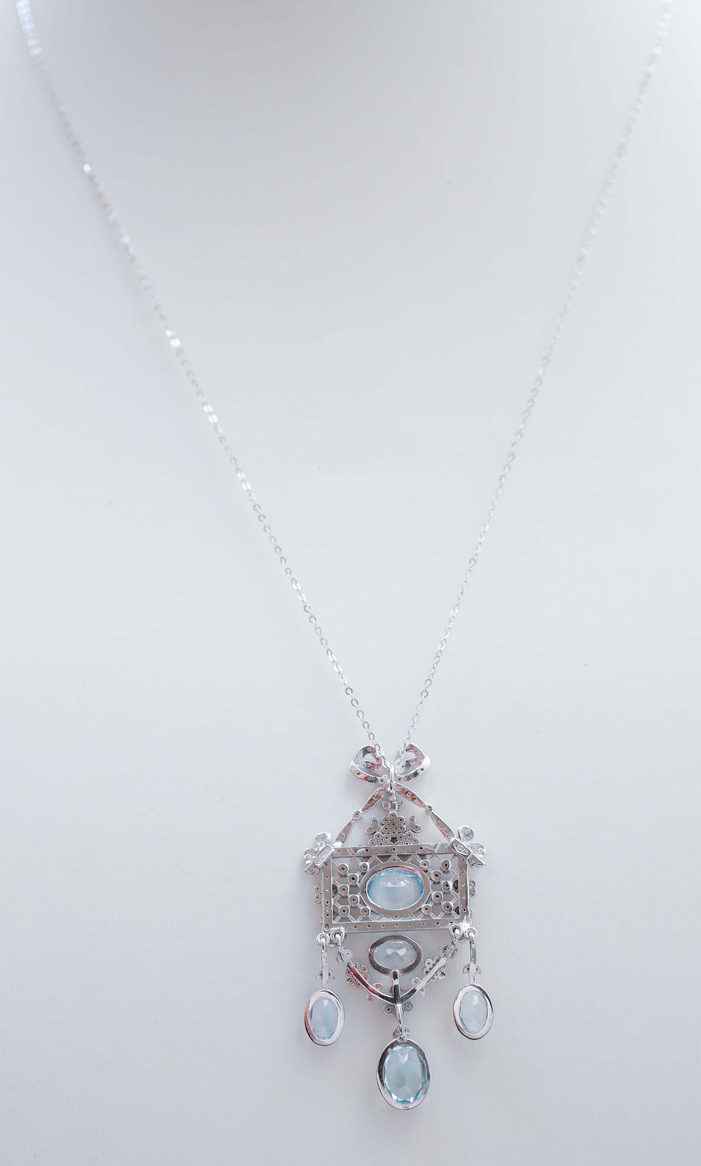 Mixed Cut Aquamarine Colour Topazs, Diamonds, 14 Karat White Gold Pendant Necklace. For Sale