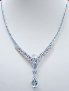 Aquamarine Colour Topazs, Diamonds, 14 Karat White Gold Tennis Necklace.