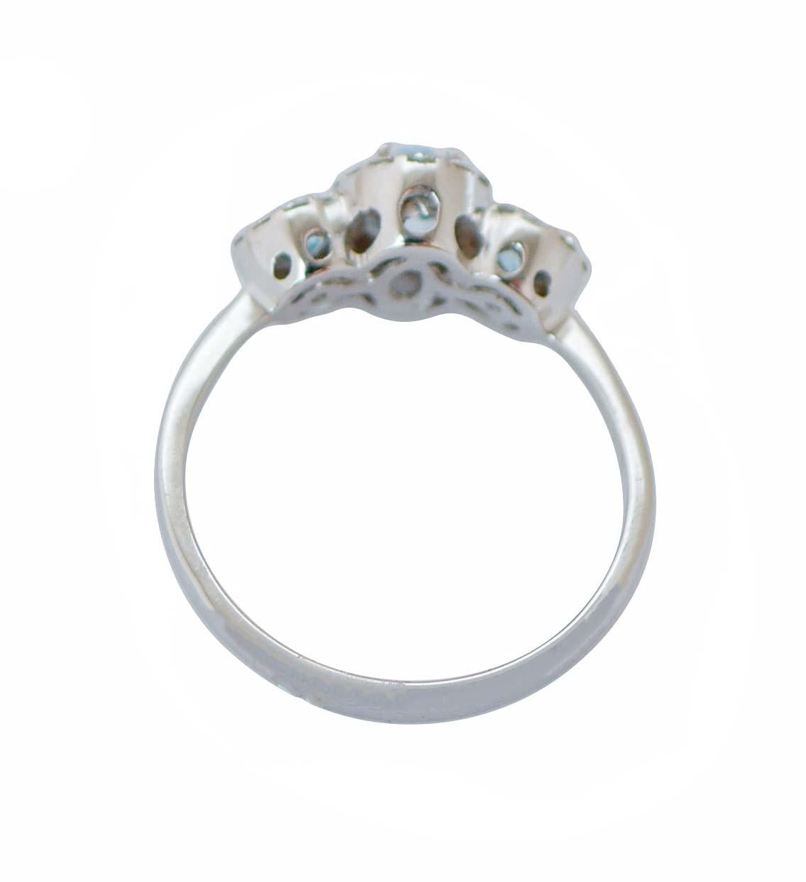 Modern Aquamarine Colour Topazs, Diamonds, 18 Karat White Gold Ring. For Sale
