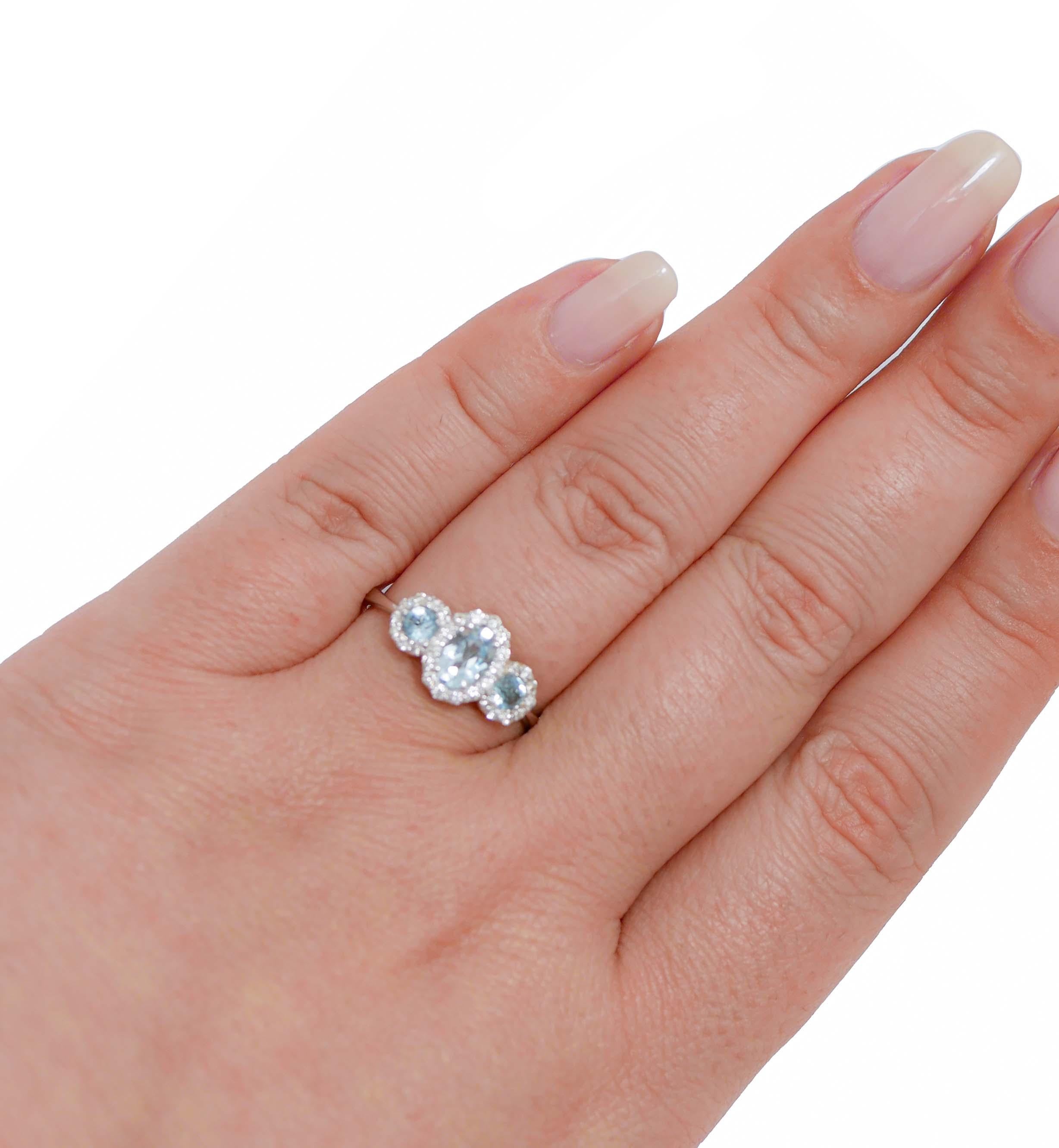 Anello con Topazi color acquamarina, diamanti, oro bianco 18 carati. In condizioni Nuovo in vendita a Marcianise, Marcianise (CE)