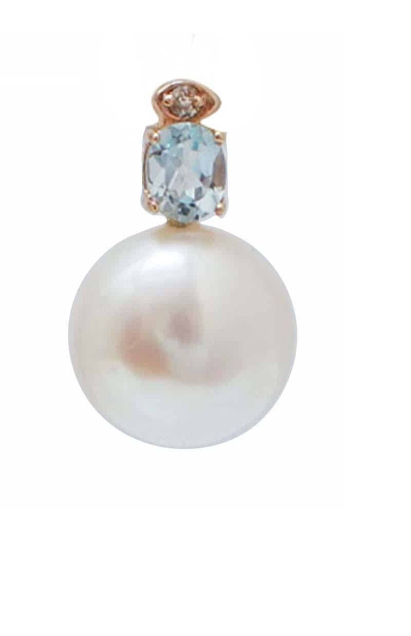 Superbes boucles d'oreilles en or rose 14 carats montées avec un diamant et une topaze dans la partie supérieure ; en dessous, une perle blanche.
Diamants 0,04 ct
Topazes 0,92 ct
Perles 3.40 gr - 11 mm
Poids total 4.70 gr
RF +IUO

Pour toute