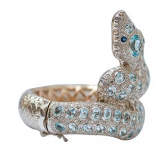 Aquamarine Colour Topazs, Diamonds, Sapphires, Rose Gold and Silver Bracelet.