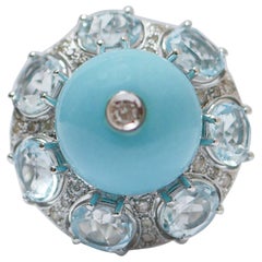 Topazi color acquamarina, magnesite, diamanti, anello in oro bianco 14 carati.
