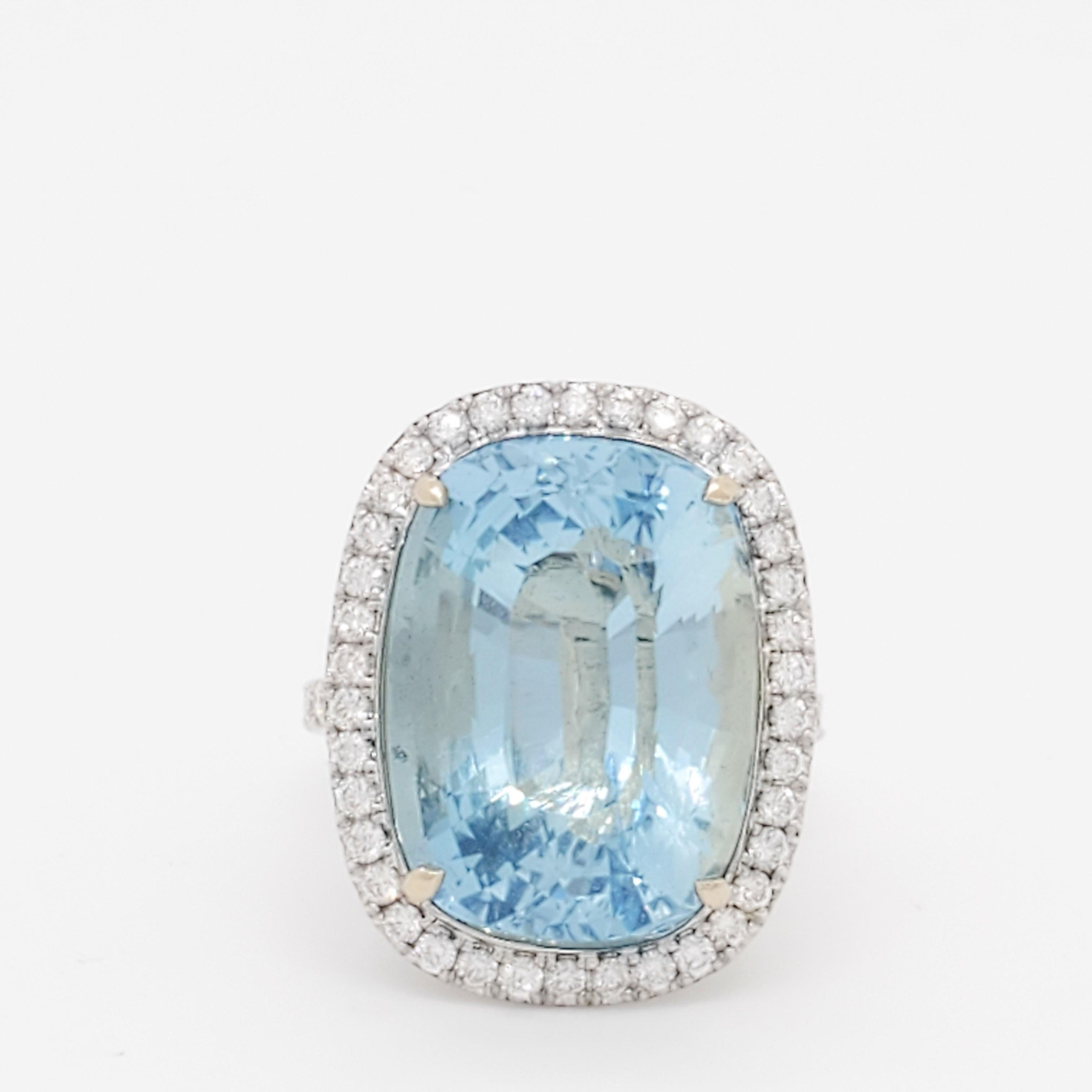 Gorgeous 14.10 ct. aquamarine cushion with 0.82 ct. good quality white diamond rounds.  Handmade in 18k white and yellow gold.  Ring size 6.5.