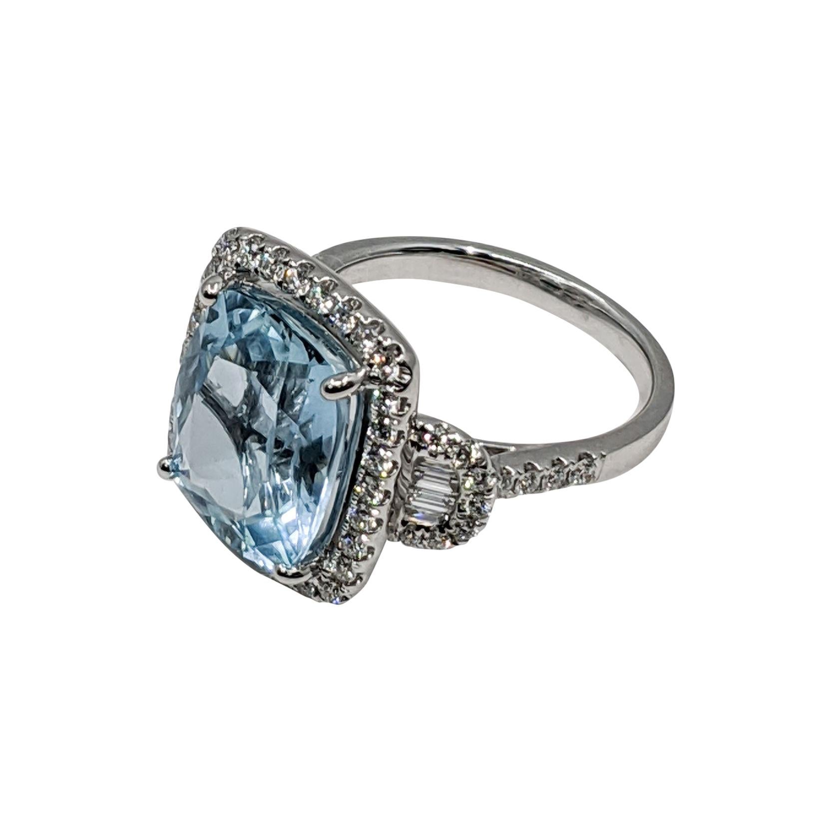 Aquamarine Cushion Fancy Ring. White Diamond and 18k Gold
Cushion Cut
5.50 Carats of Aquamarine
.69 Carats of Diamonds 