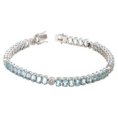 10,87 Karat ovales Aquamarin- und Diamant-Tennisarmband aus Weißgold
