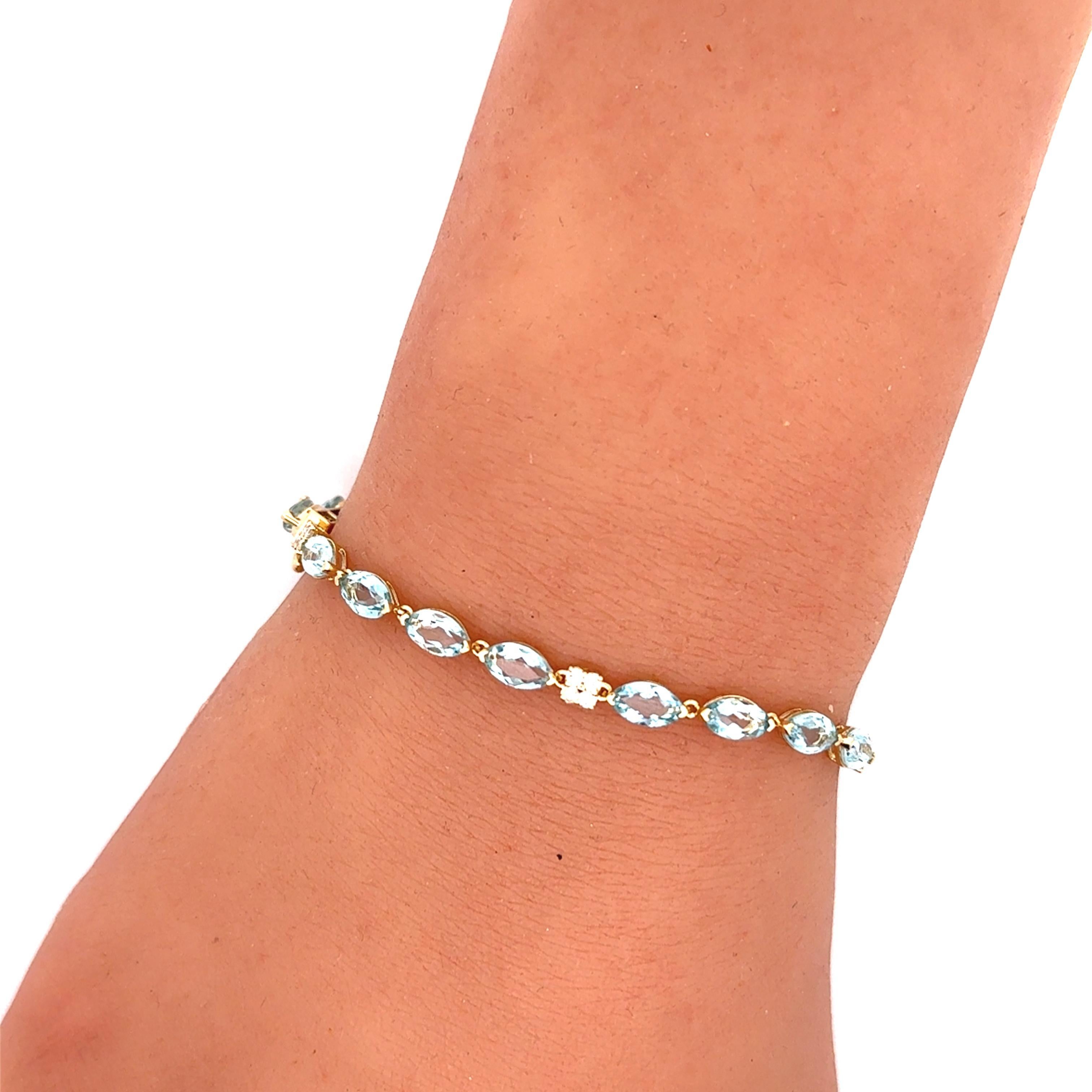 Tennisarmband aus 14 Karat Gelbgold mit Aquamarin und Diamant (Gemischter Schliff) im Angebot