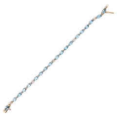 Bracciale tennis in oro giallo 14k con diamante e acquamarina