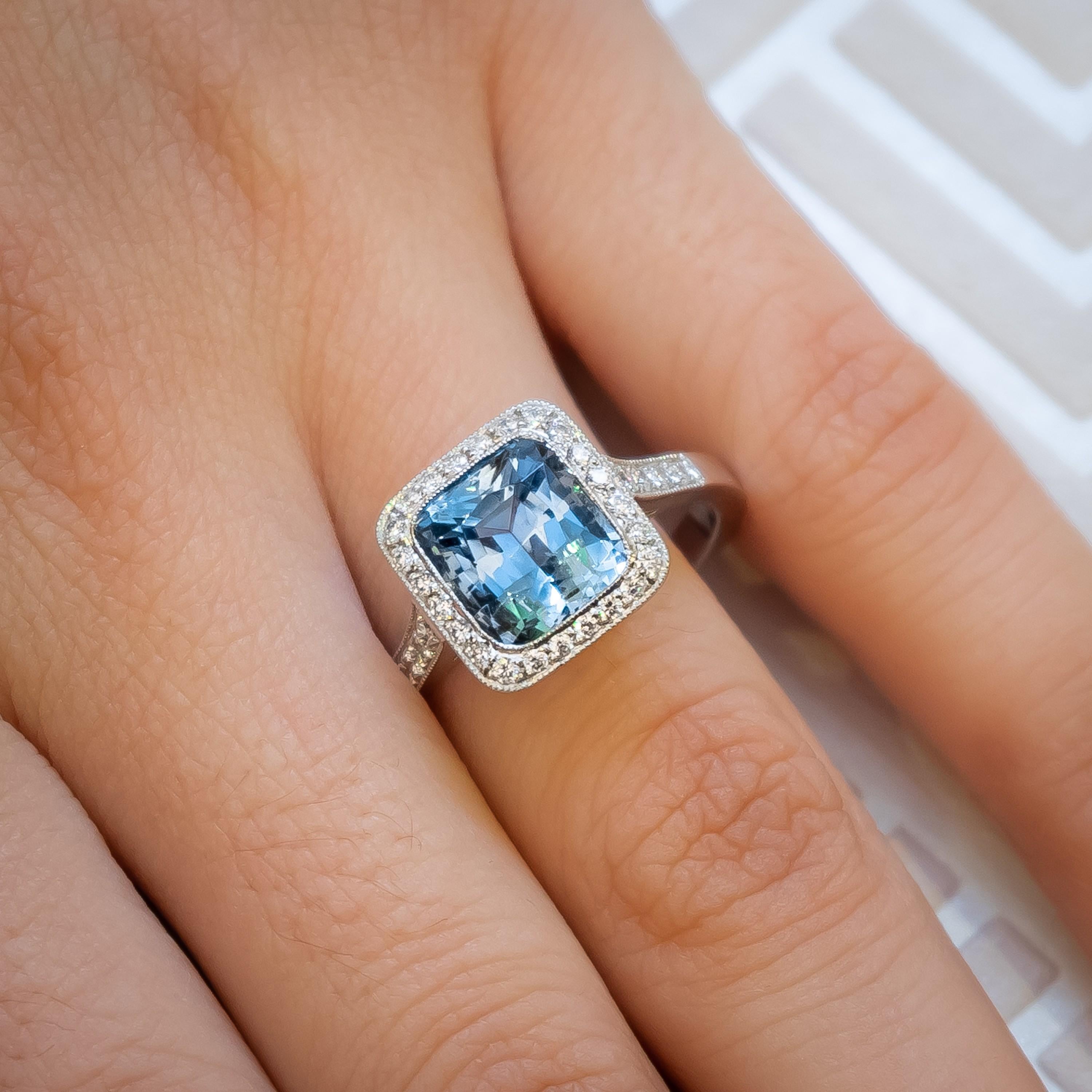 Modern Aquamarine, Diamond and Platinum Cluster Ring For Sale