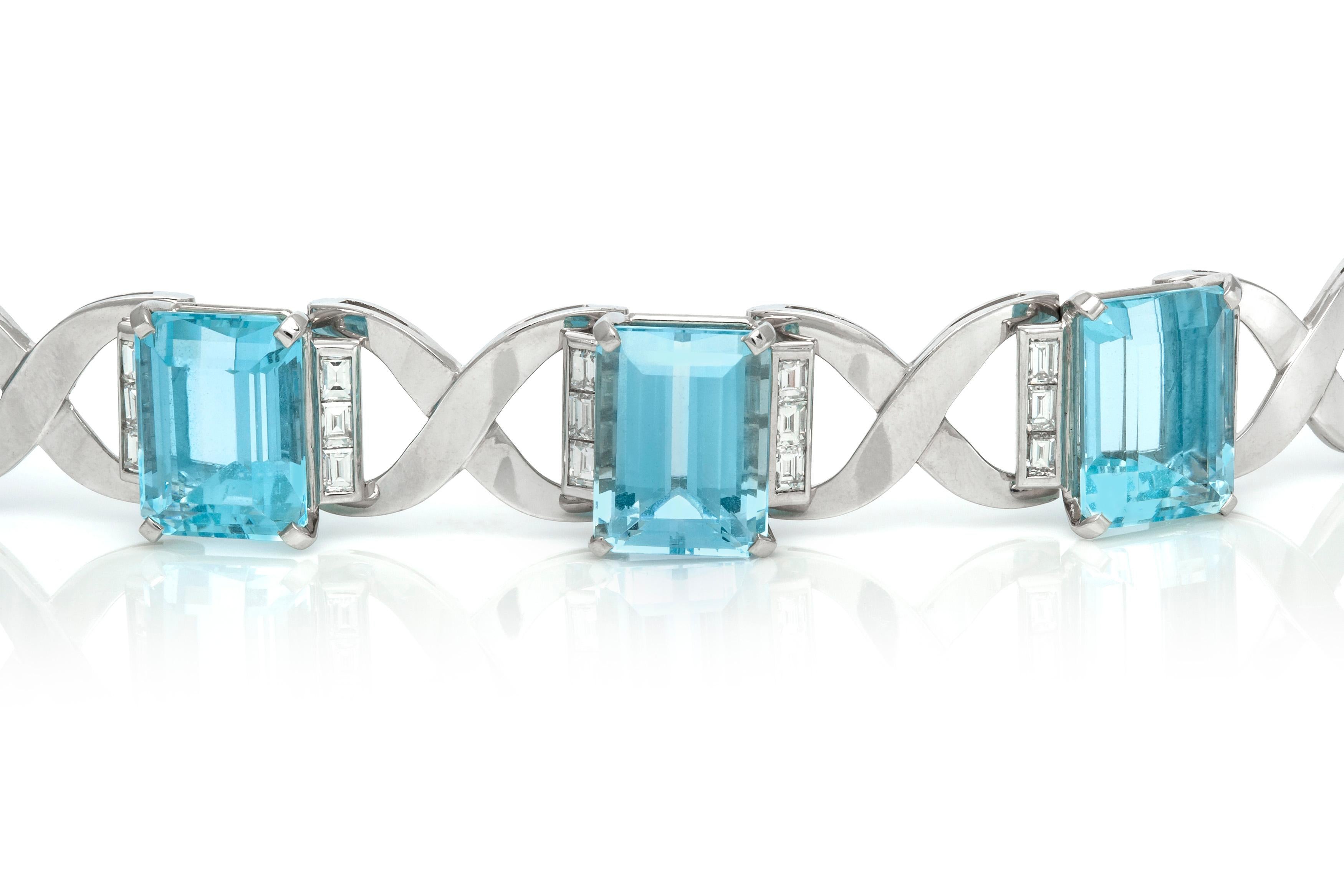 Bracelet, finely crafted in 18k white gold with aquamarine weighing approximately a total of 90.00 carats and diamonds weighing approximately a total of 4.50 carats.