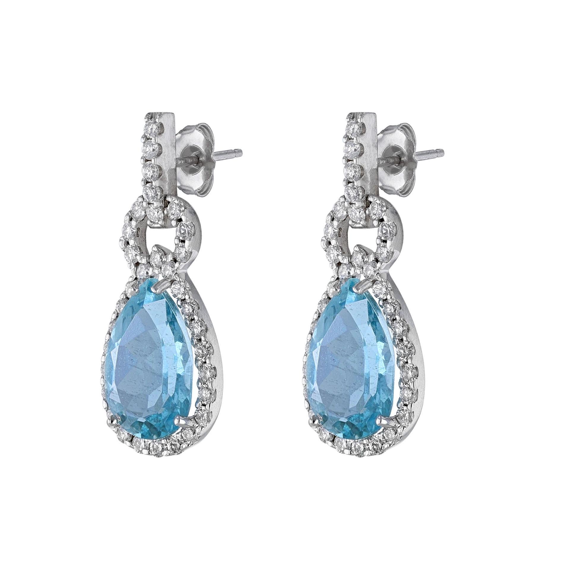 These earrings are made of 14k white gold and features 2 Pear Shape Aquamarine weighing a combined total weight of 9.46 carats. On a mounting of 60 round cut diamonds weighing 1.72cts. All stones are prong set. Earrings have a post backing.