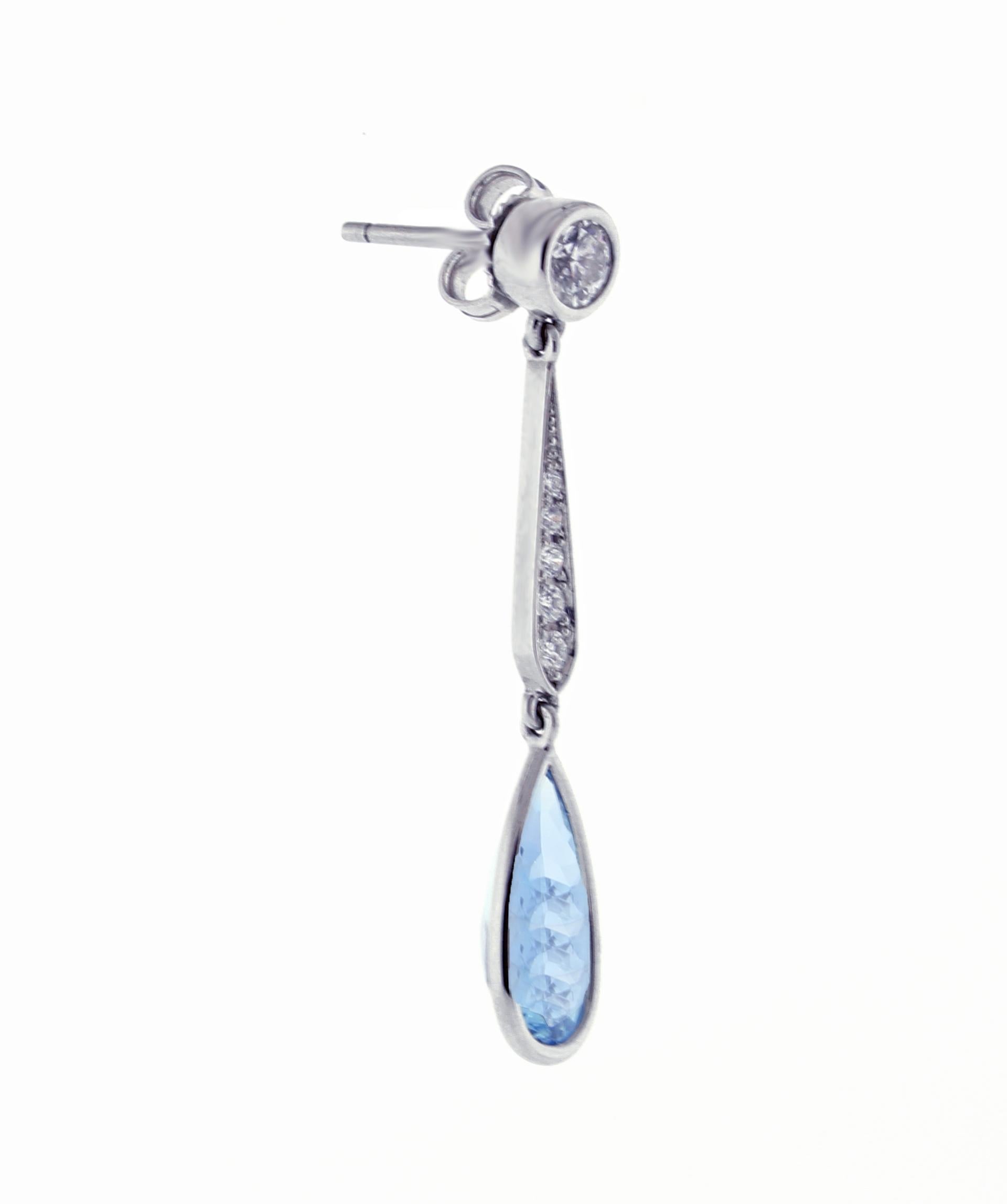  From Pampillonia Jewelers a pair of  teardrop aquamarine and diamond drop earrings
 ♦ Designer: Pampillonia
♦ Metal: Platinum
♦  2 Diamonds=.48 carat
♦ 10 Diamonds= 14 carats
♦ 2 Aquas=3.19
♦ Size  1 ½ inches long
♦ Packaging: Pampillonia