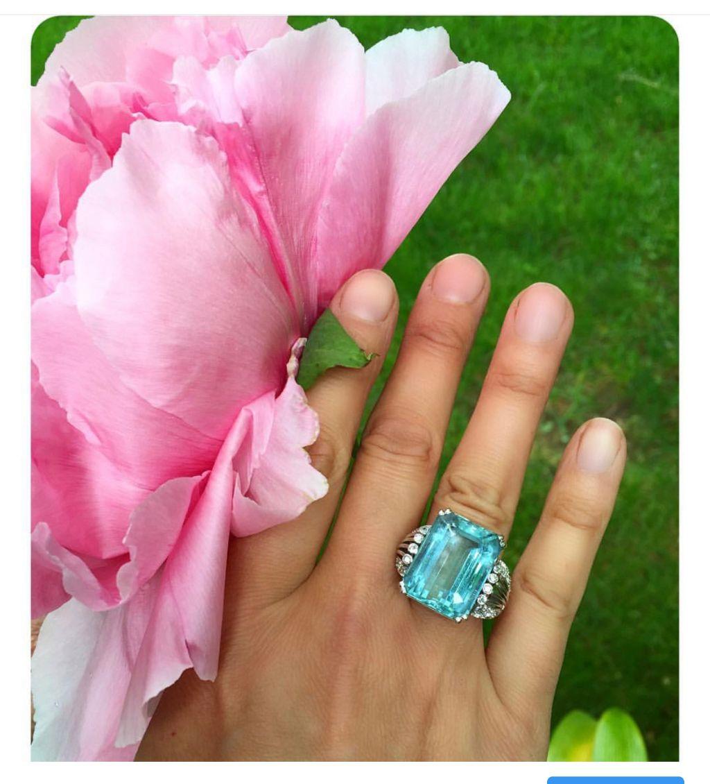 Gorgeous large white gold 14k aquamarine ring circa 1940s glamour and deco style. Diamond total weight is about .52 carats G-VS. Size 6.5. Condition is excellent. Over 20 carats. 