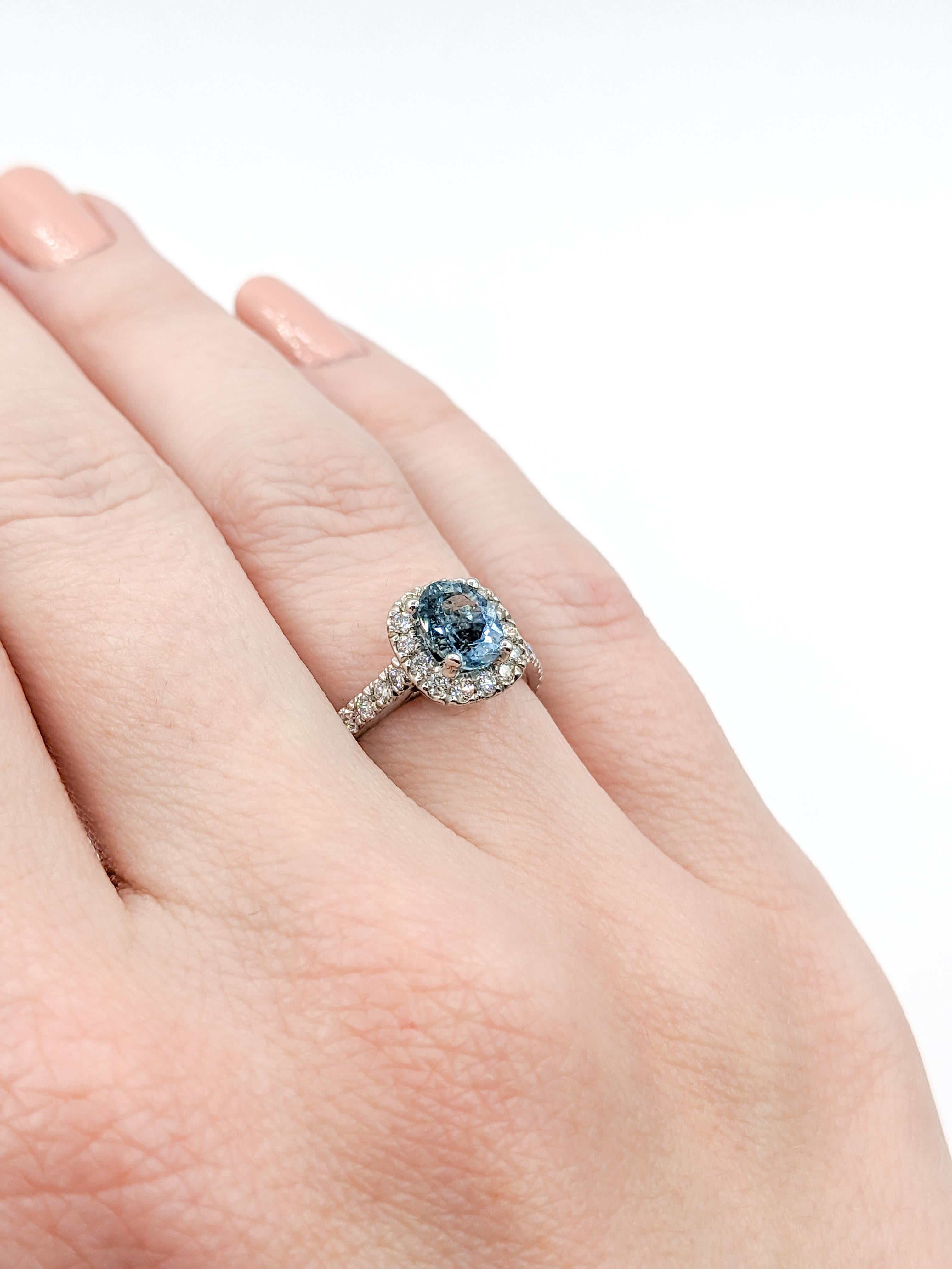 Dreamy Natural Aquamarine & Diamond Halo Ring

This stunning piece of jewelry is a 14k white gold ring adorned with .33 carat total weight round diamonds. The diamonds are of G color and SI1 clarity, adding to the ring's sparkle. Along with the