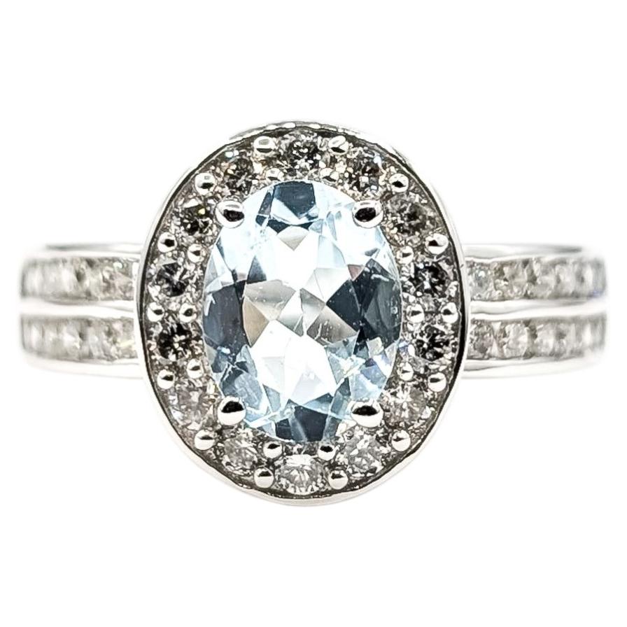 Aquamarin- und Diamant-Halo-Ring aus 14-karätigem Weißgold