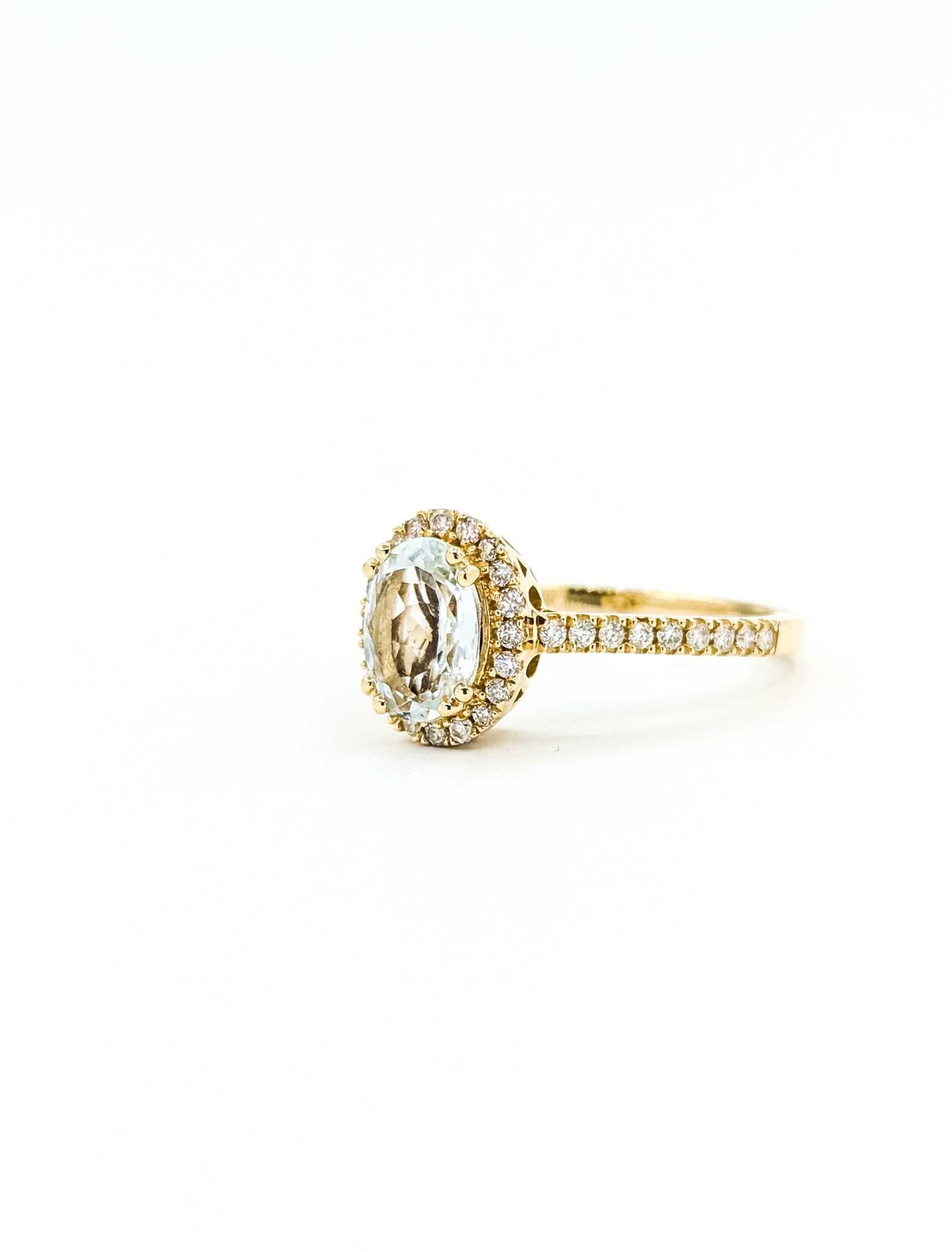 Contemporaneo Anello aureola con acquamarina e diamante in oro giallo 14k in vendita
