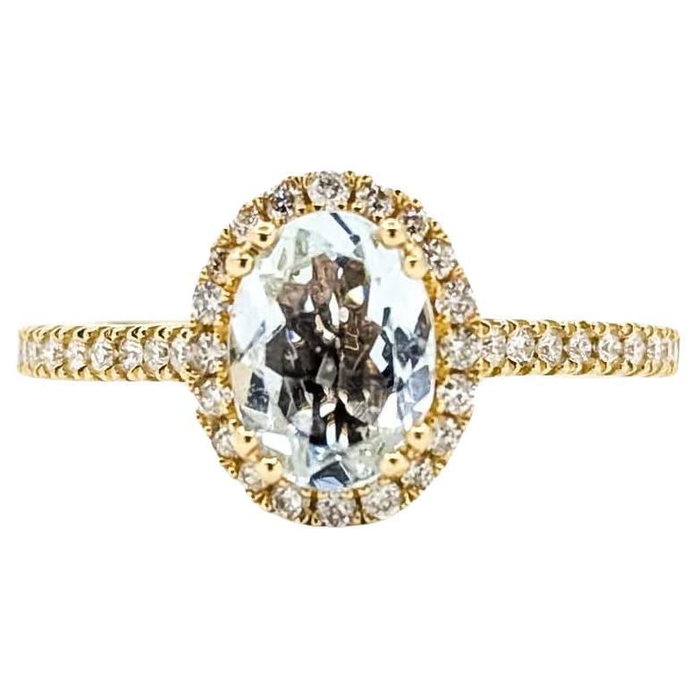 Anello aureola con acquamarina e diamante in oro giallo 14k in vendita