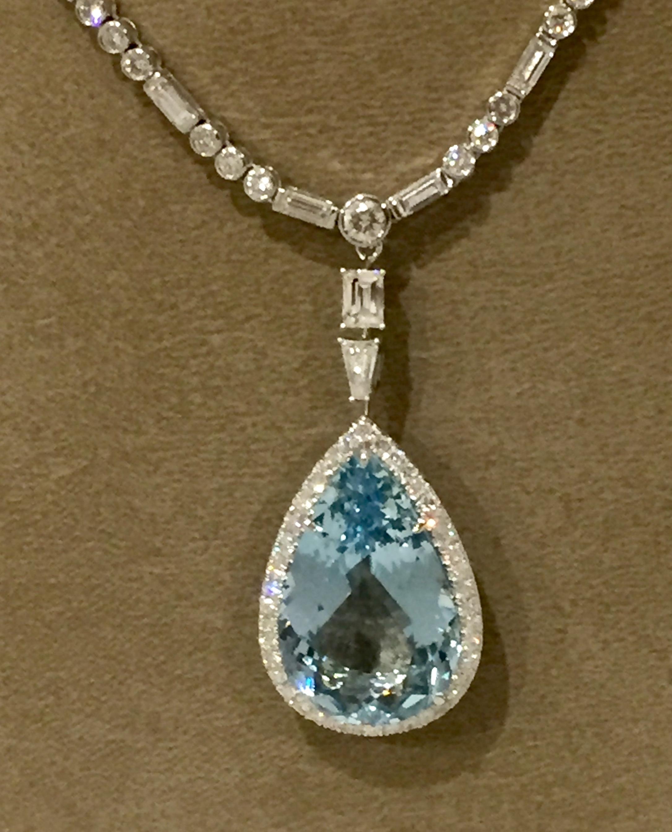 Beautiful Diamond Necklace with Aquamarine-Diamond-Pendant, made in Platinum 950 and White Gold 750! The necklace is set with 61 brilliant cut diamonds weighing 1.95 ct, G, vs, and 20 baguette diamonds of 1.91 ct, G, vs. 
The fine pear shaped