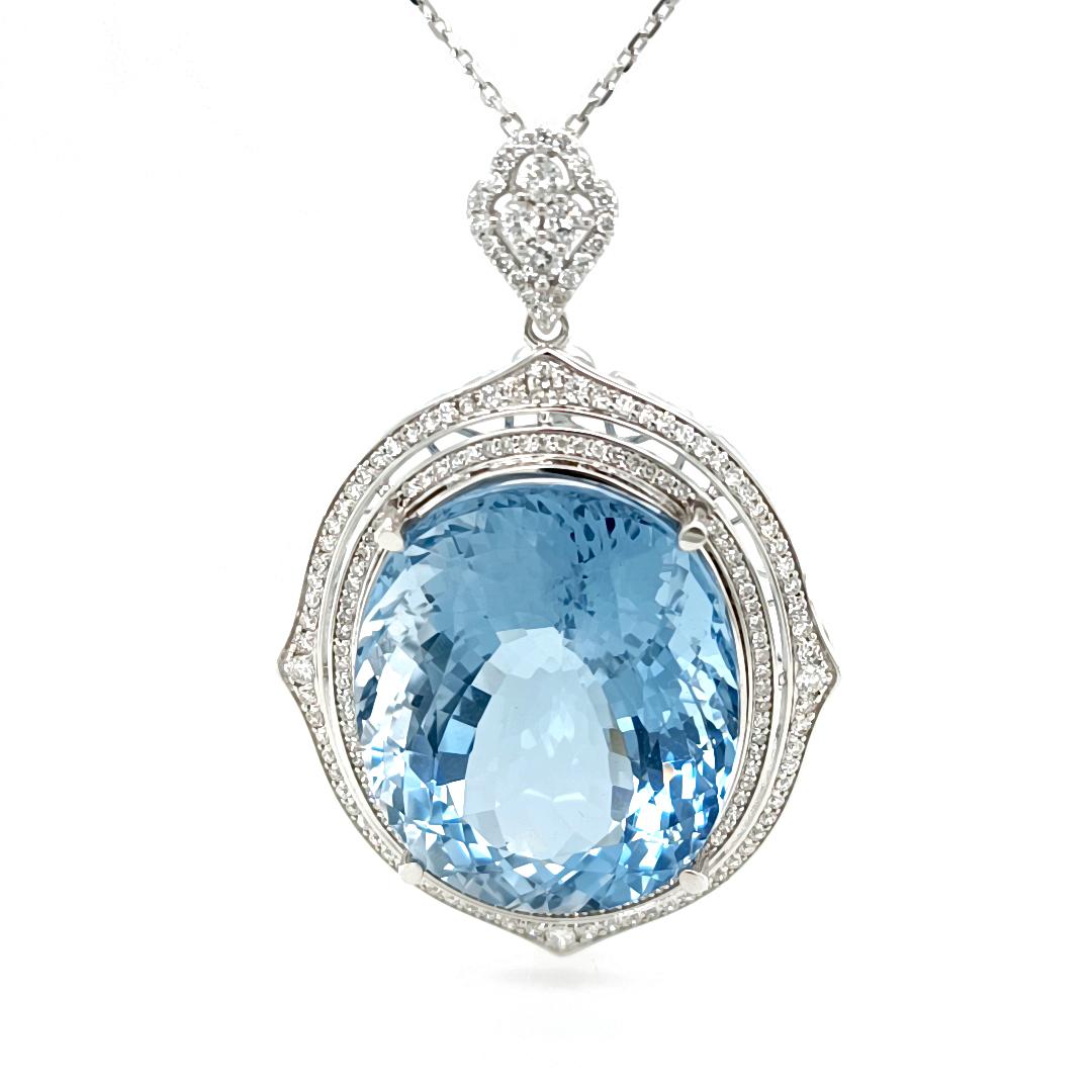 75.2 Ct oval cut aquamarine encircled by diamonds 1.66 Ct

Set in 14K white gold, 14.60 Grams