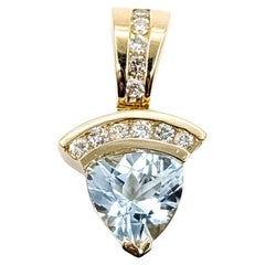 Aquamarine 
Diamond Pendant in 14k Yellow Gold