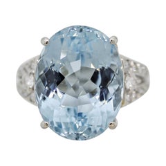 Anello cocktail in platino con diamante e acquamarina