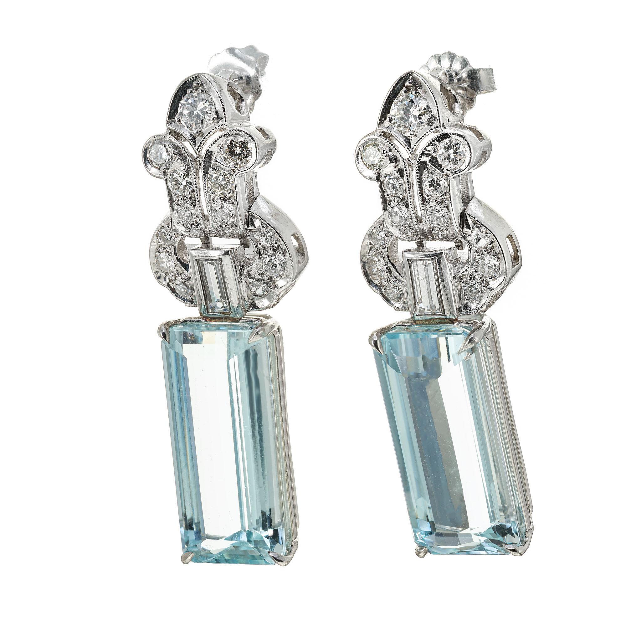 Late Art Deco, 1940's Original aqua and diamond earrings. 2 emerald cut elongated aquamarines 16.70cts set in platinum with 2 emerald and 30 round cut accent diamonds. 

2 greenish blue Emerald cut Aquamarine, approx. total weight 16.70cts, VVS –