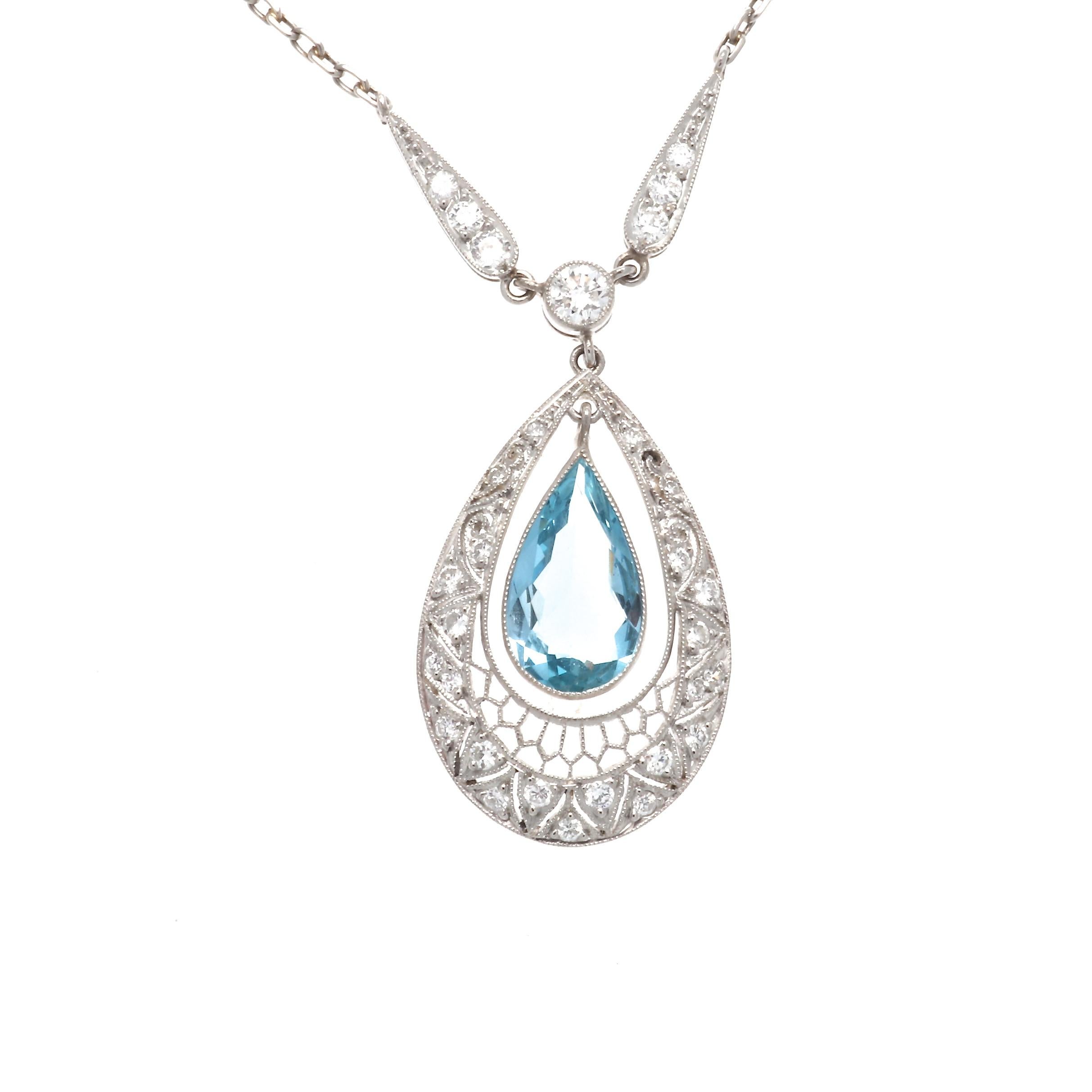 The jewel of the ocean in an Art Deco inspired necklace. Featuring a pendant designed with a glowing pear shaped aquamarine resting between diamonds and expertly crafted platinum. Hanging from a delicate platinum chain.