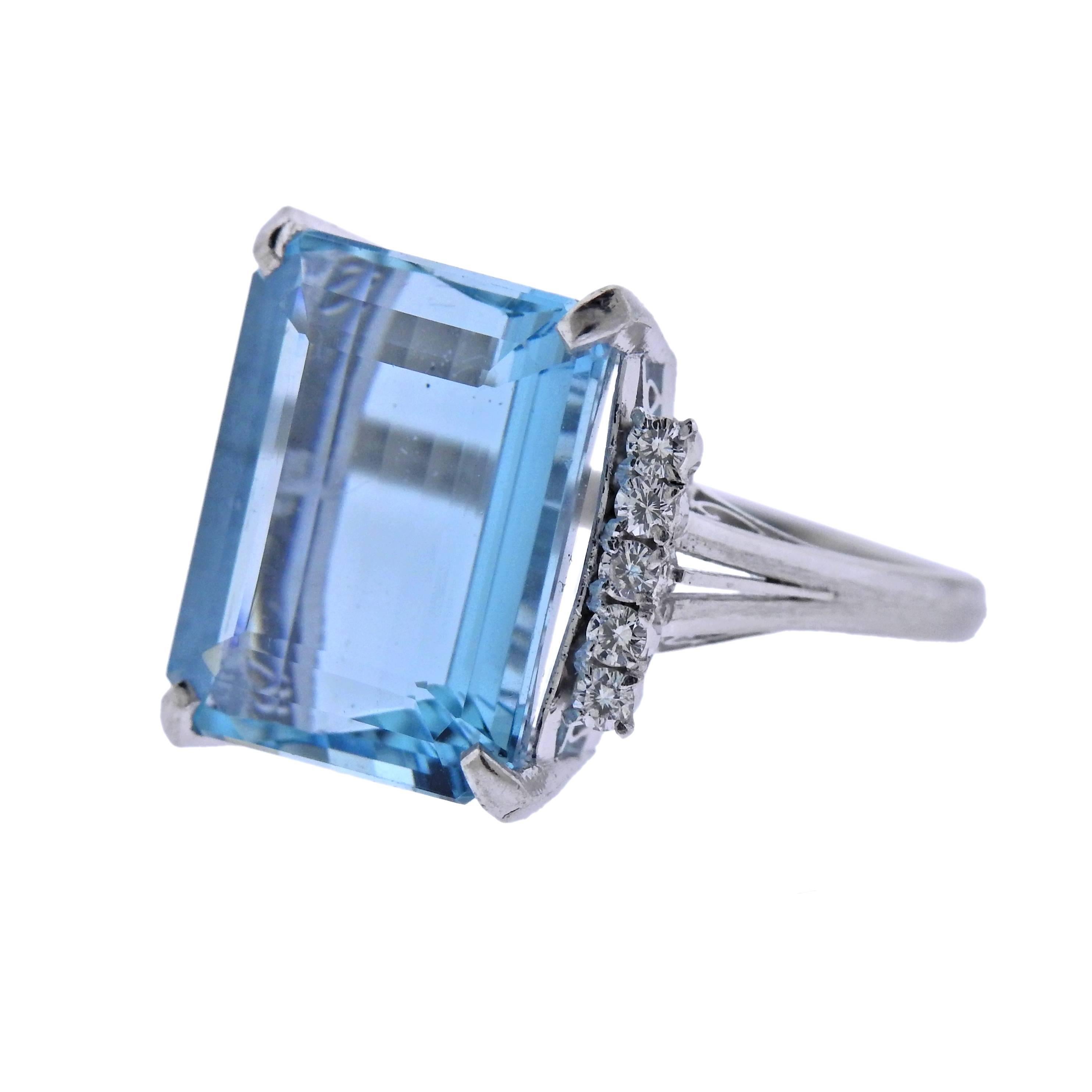  Classic platinum cocktail ring, featuring 16.07ct aquamarine, surrounded with 0.33ctw in diamonds. Ring size - 8, ring top - 16.8mm x 16.7mm, weighs 11.3 grams. Marked: Pt900, A1607, 033.