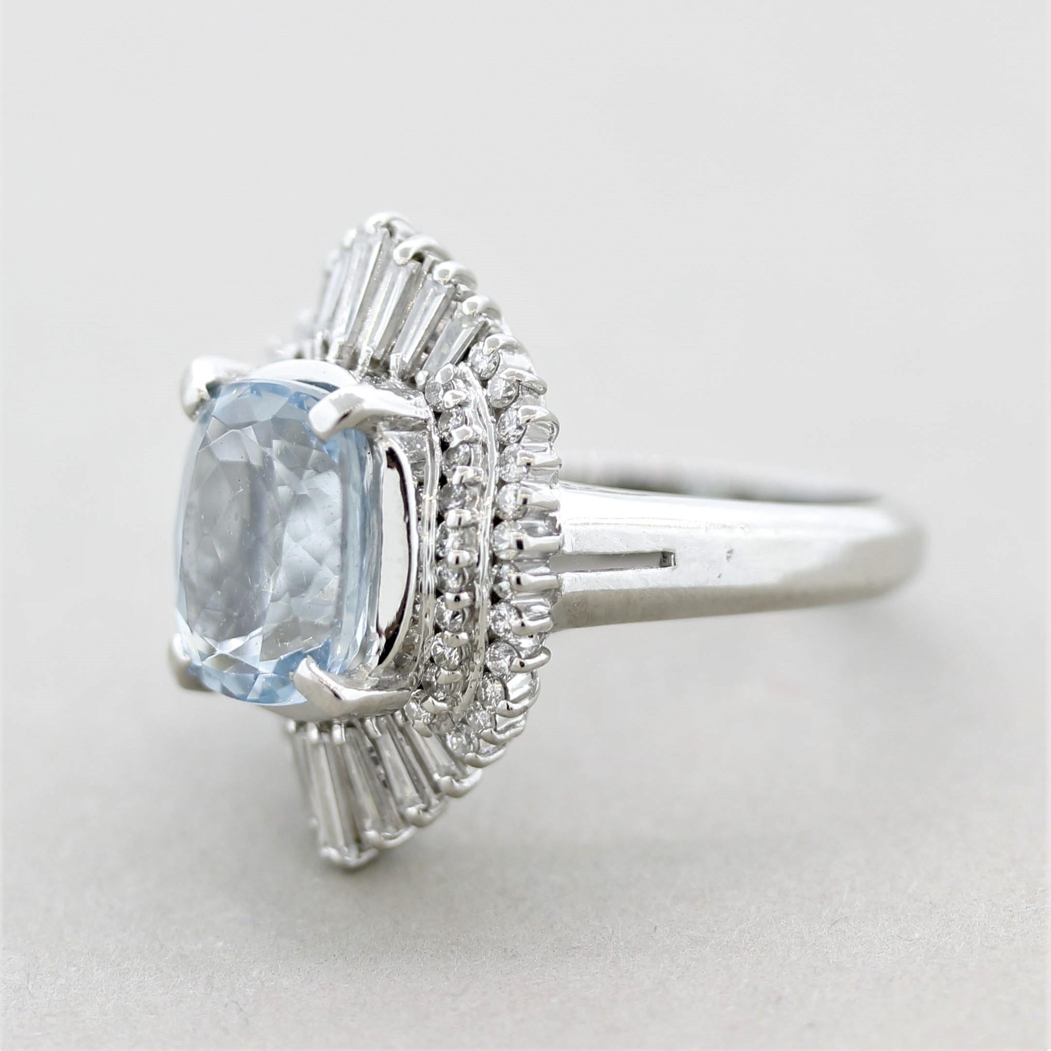 A sweet aquamarine and diamond ring! It features a 3.28 carat cushion-shaped aquamarine with a bright and lively sea-blue color. It is accented by 0.77 carats of round brilliant-cut and baguette-cut diamonds which are set around the aqua in a