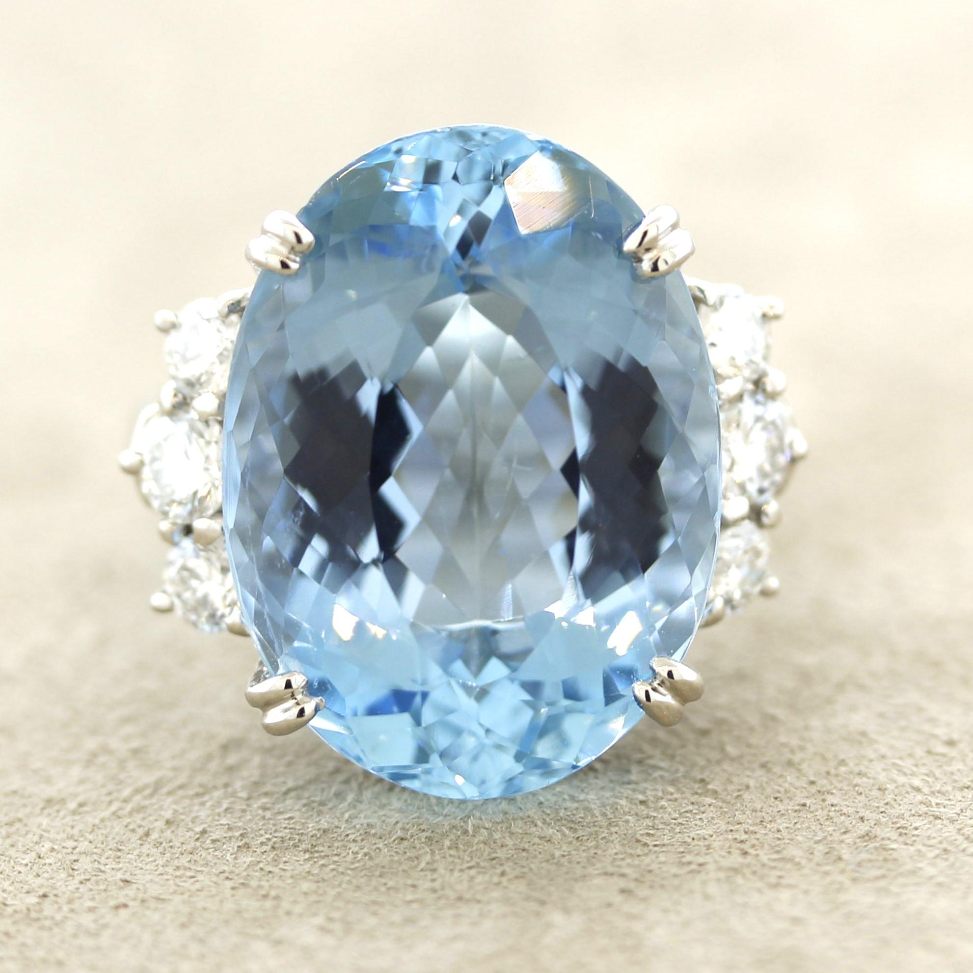 A large, impressive and fine aquamarine takes center stage! It weighs 16.45 carats and has a rich sea-blue color which only the finest aquamarines have. Many people would consider this “Santa Maria” blue color referring to the finest find of